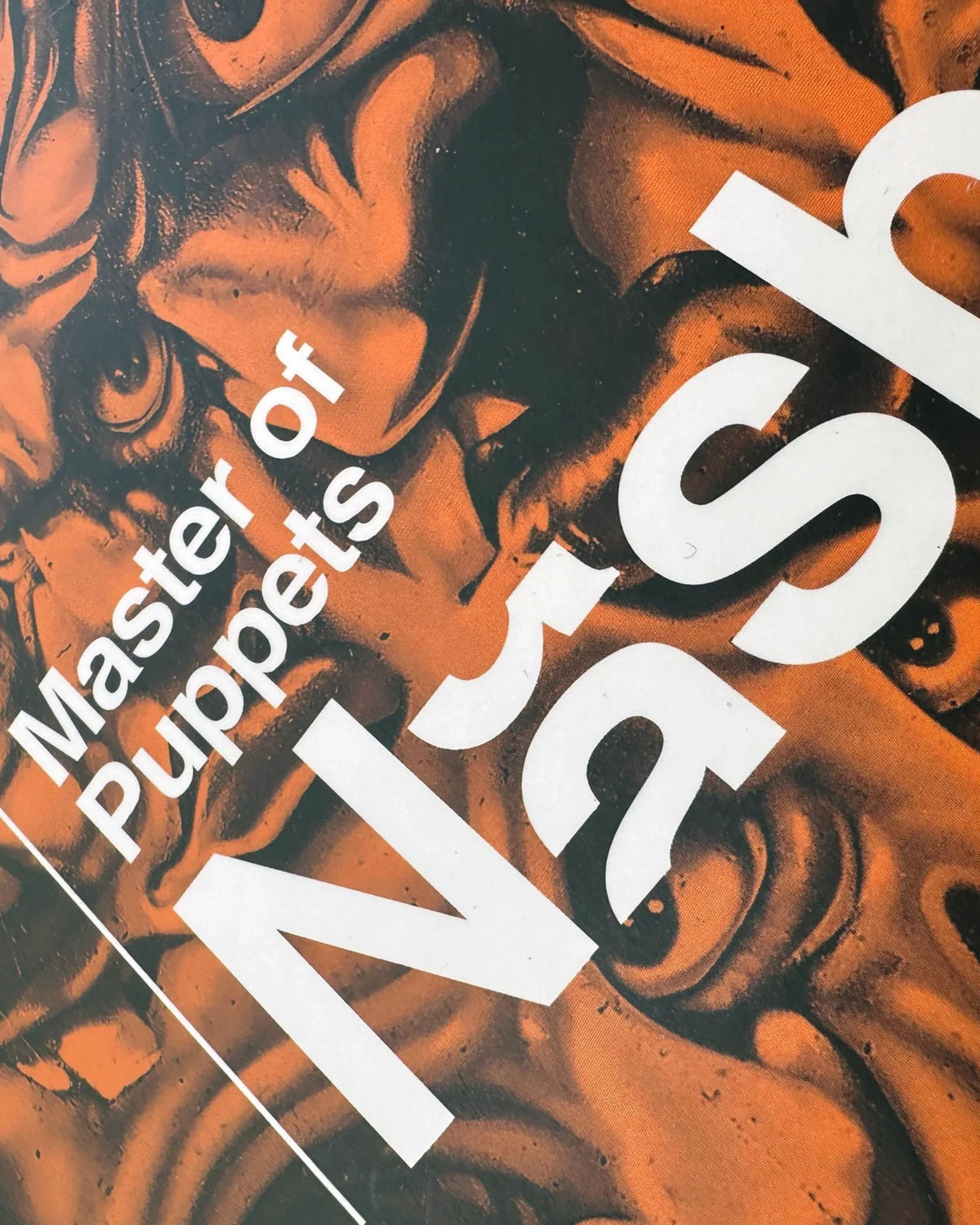 Astrofat Nash Master of Puppets softcover book featuring a bold orange and black abstract cover design