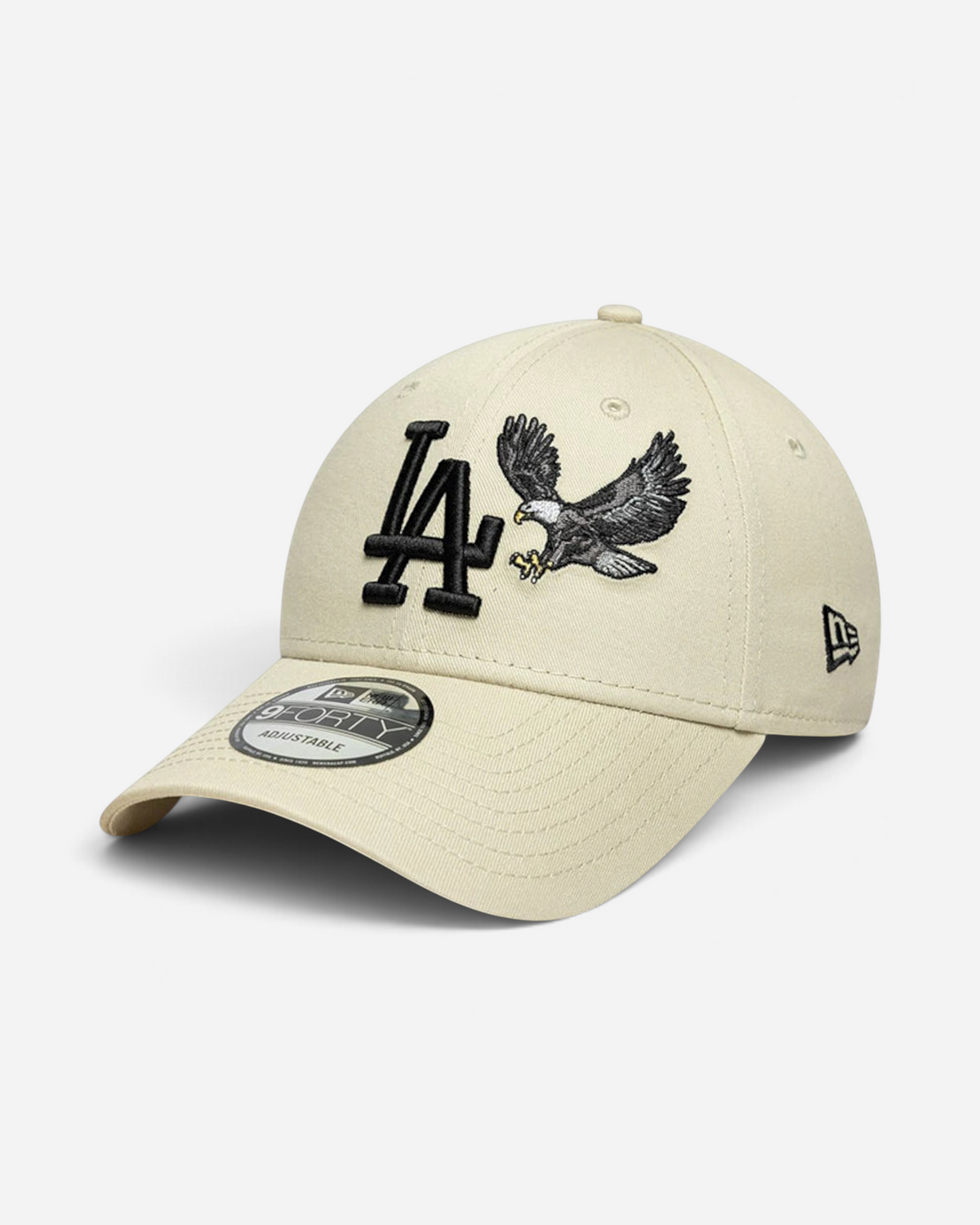 Astrofat beige 9FORTY LA Dodgers baseball cap with an embroidered eagle and black logo on a structured crown.