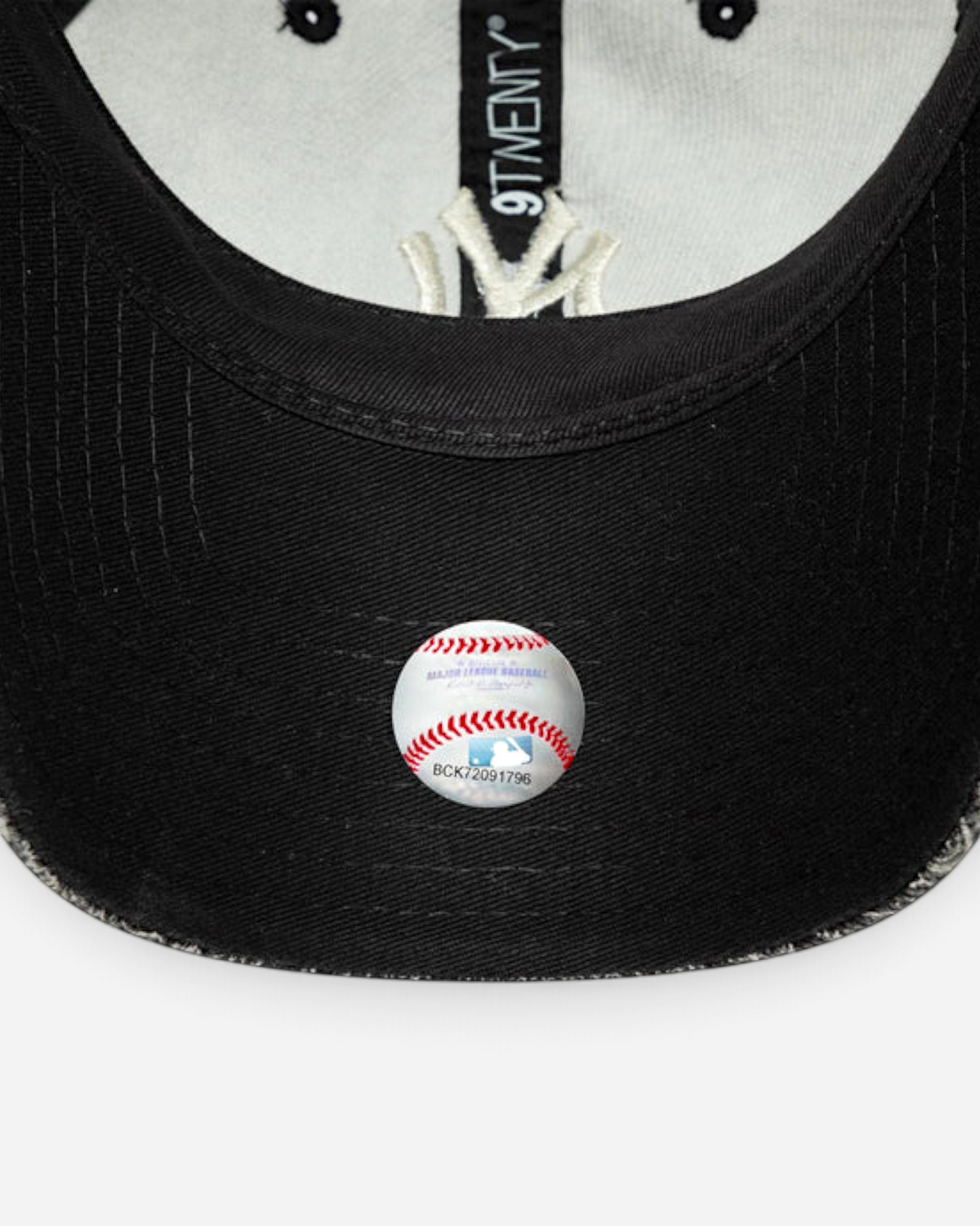 Astrofat 9TWENTY New York Yankees cap featuring a black washed paisley pattern, curved visor, and MLB logo sticker.
