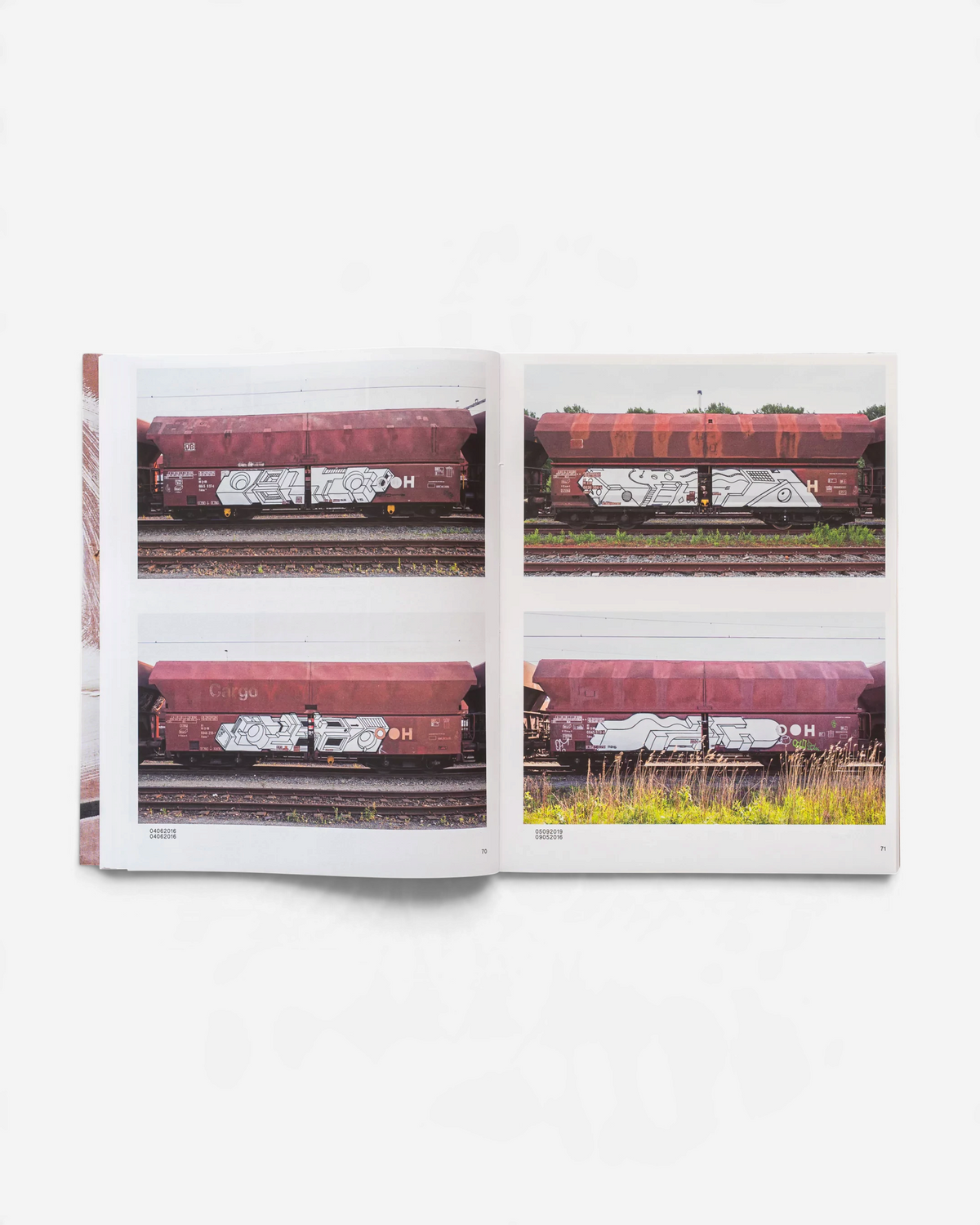 Astrofat book 121/183 by Boris DELTA Tellegen showing four photographs of graffiti on red-brown DB freight train cars