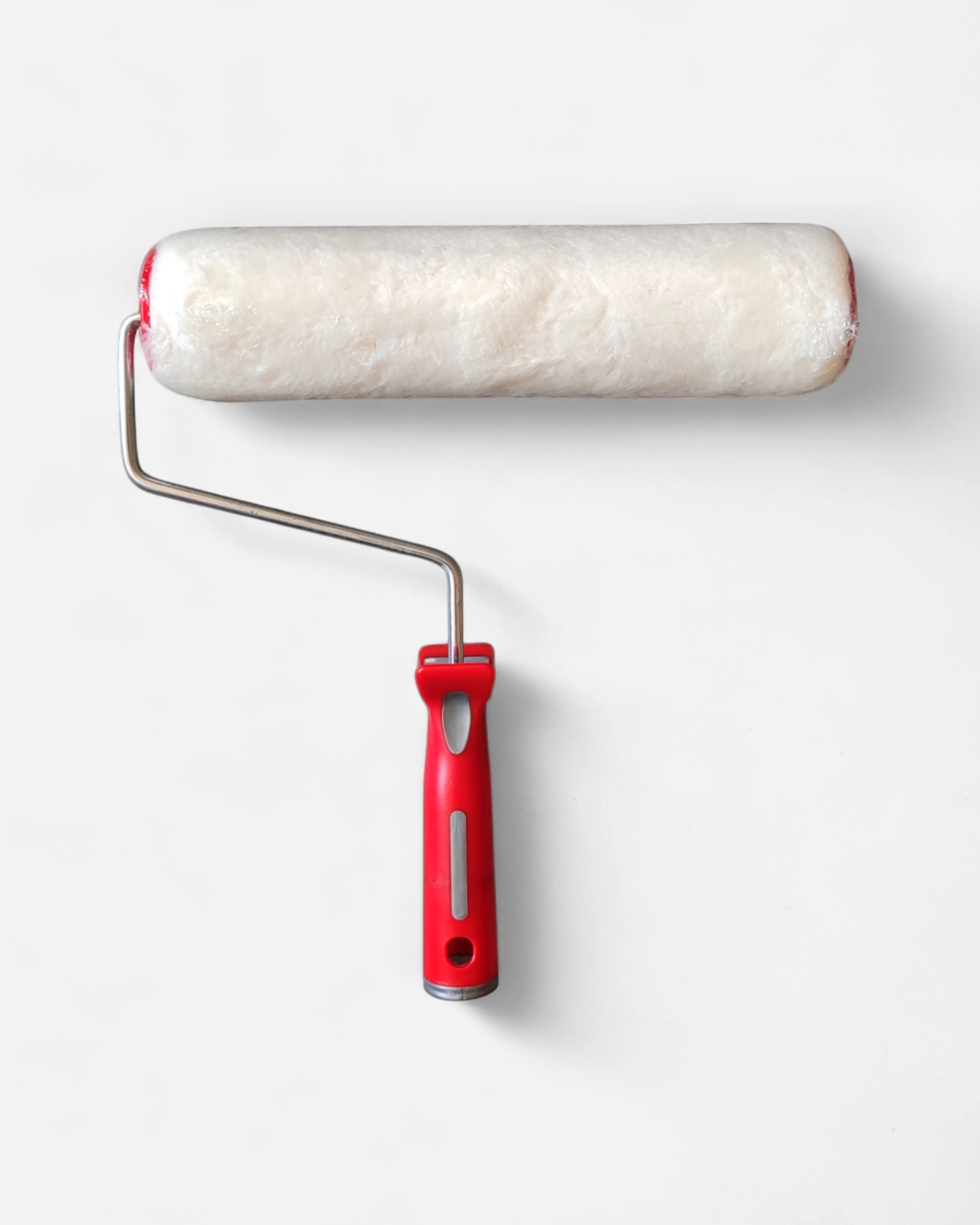 Astrofat 25cm white acrylic paint roller with red handle, ideal for smooth wall application.