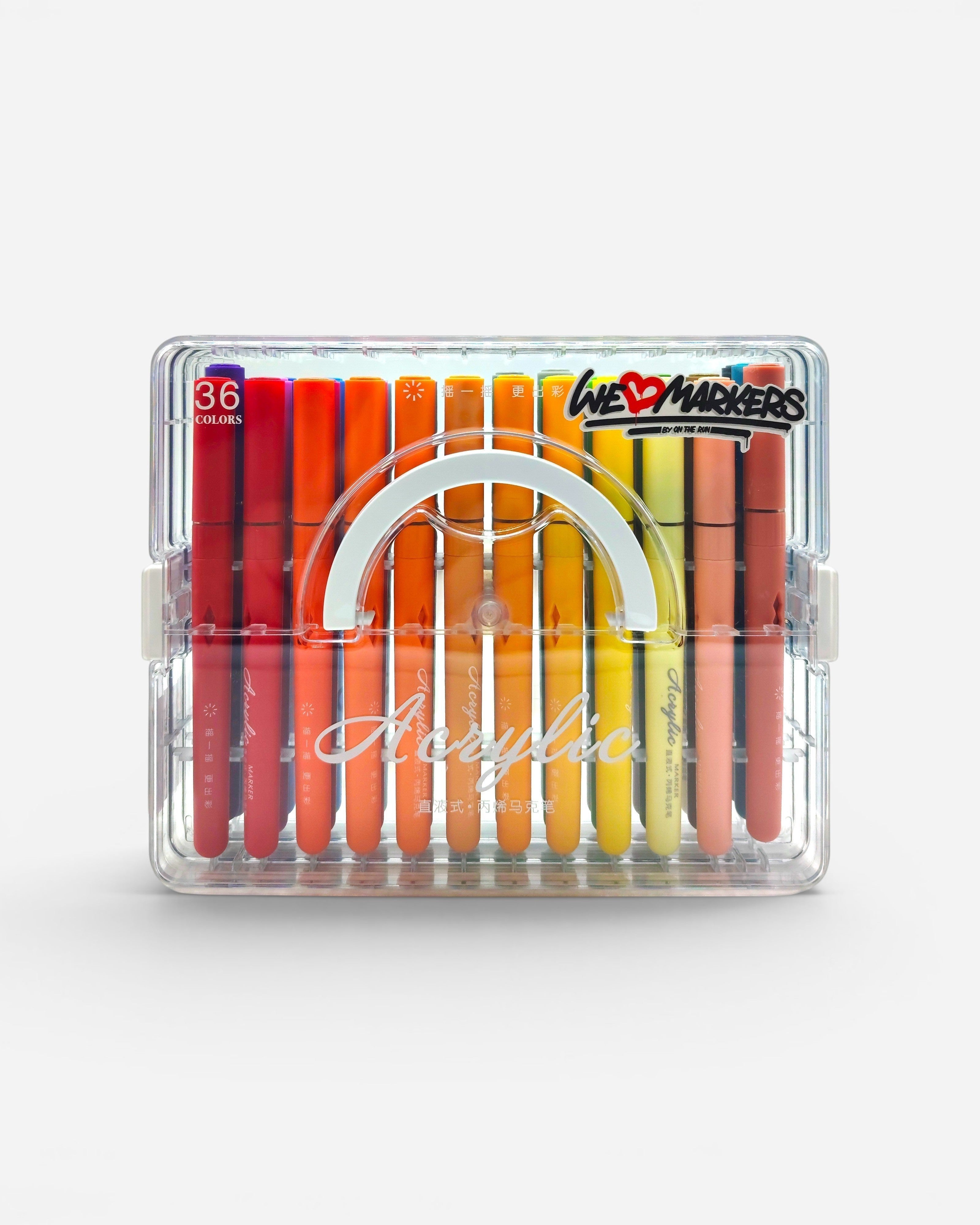 Astrofat acrylic brush marker set with 36 colors in a clear case, featuring warm tones from red to yellow.