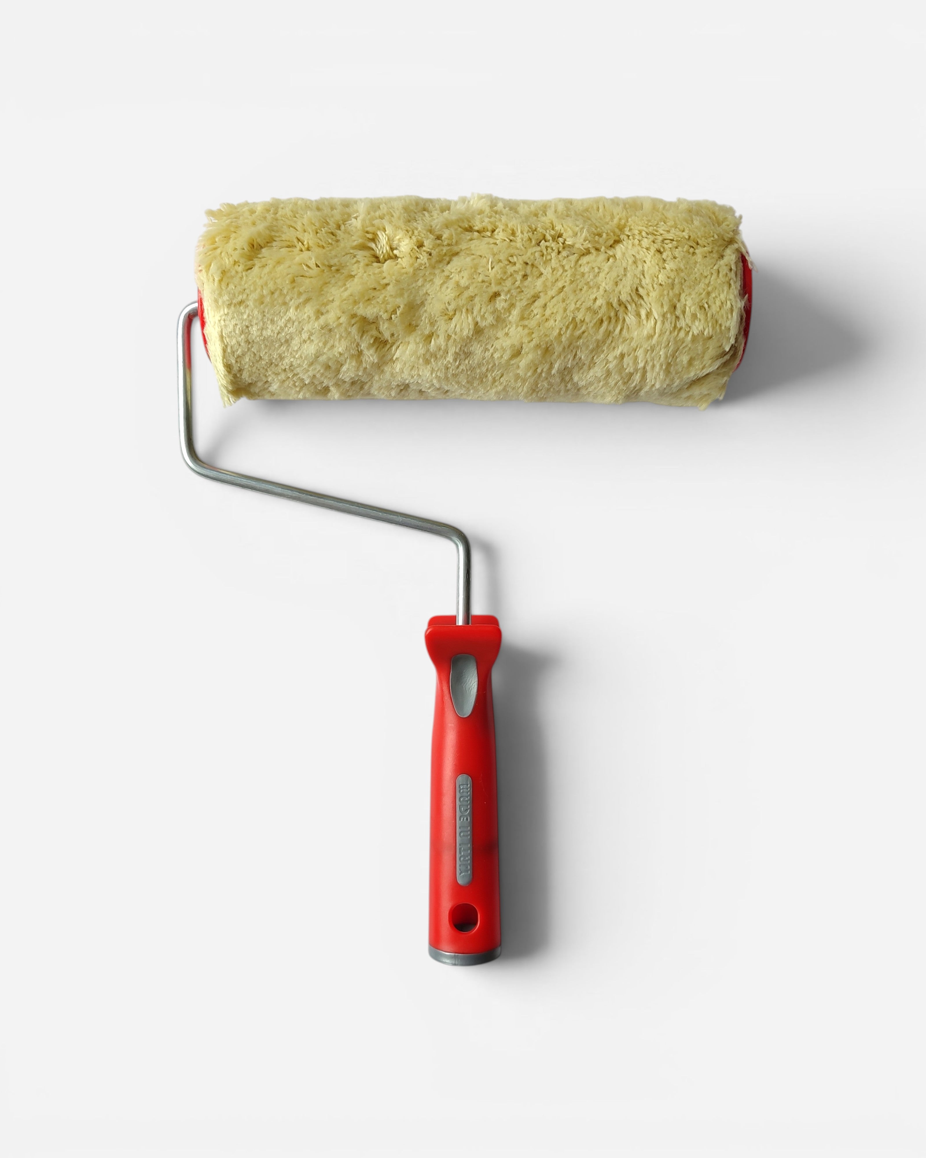Astrofat 20cm yellow acrylic paint roller with red handle, ideal for exterior walls.