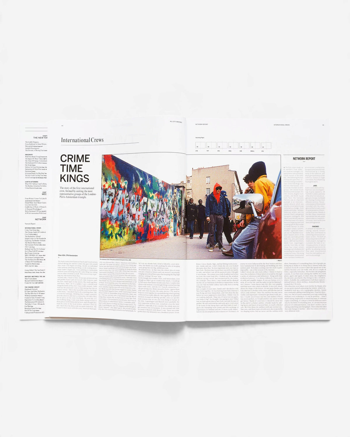 Open pages of All City Writers Edition X book featuring historical graffiti photography and detailed text articles.