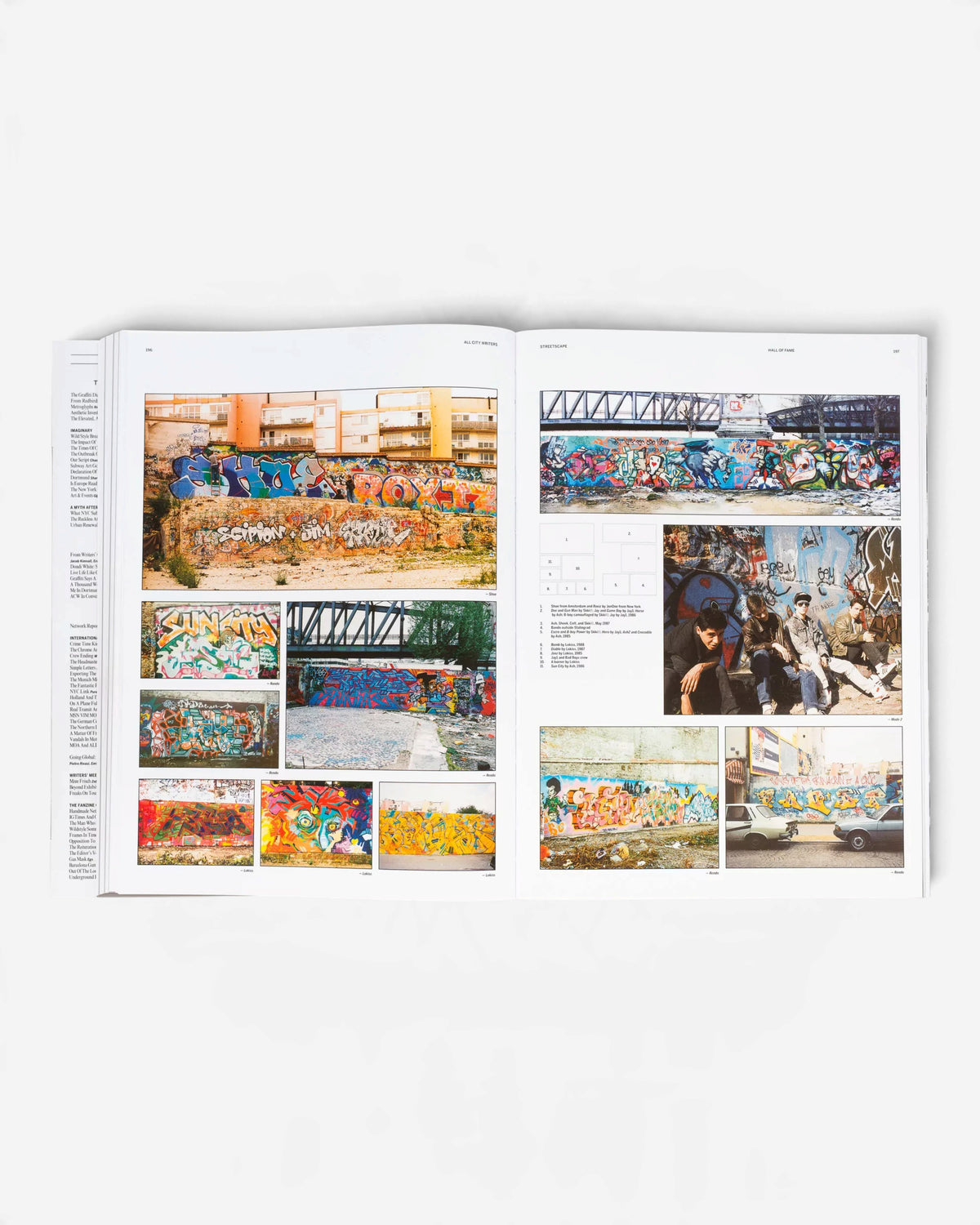 Astrofat All City Writers Edition X book open to a spread featuring historical graffiti photos and text layouts.