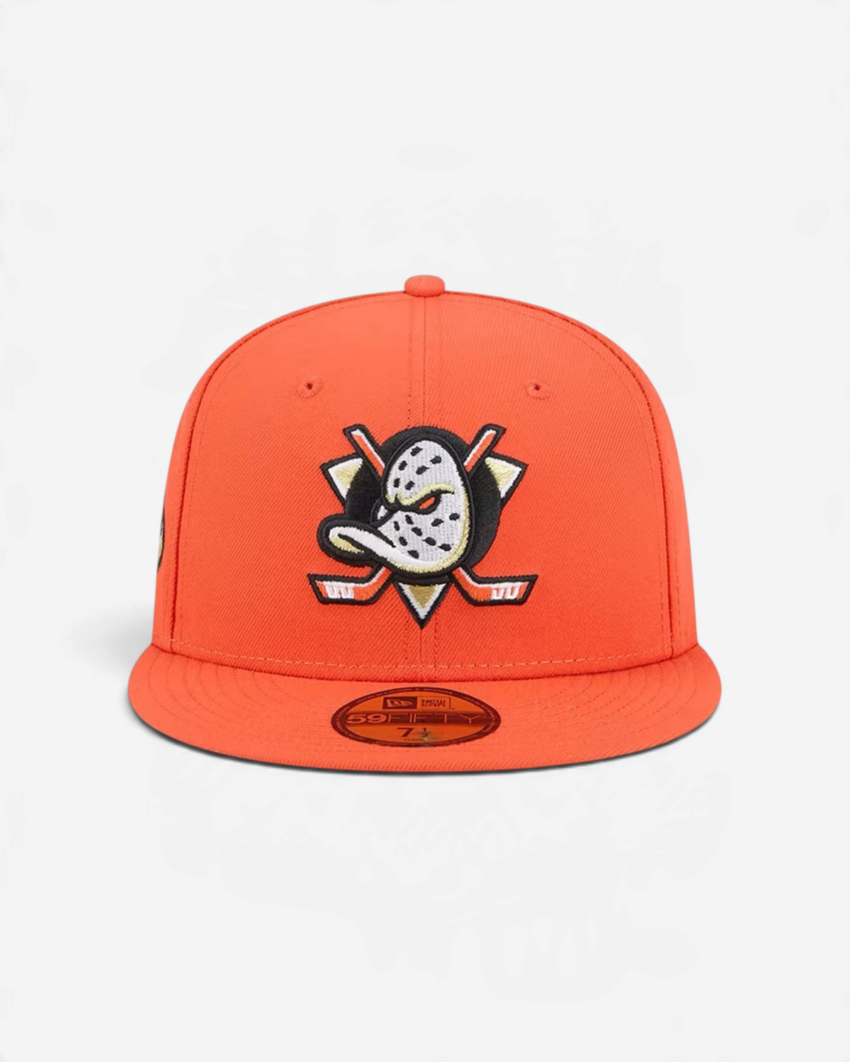 Astrofat orange Anaheim Ducks 59FIFTY fitted cap with flat visor and embroidered team logo on the front