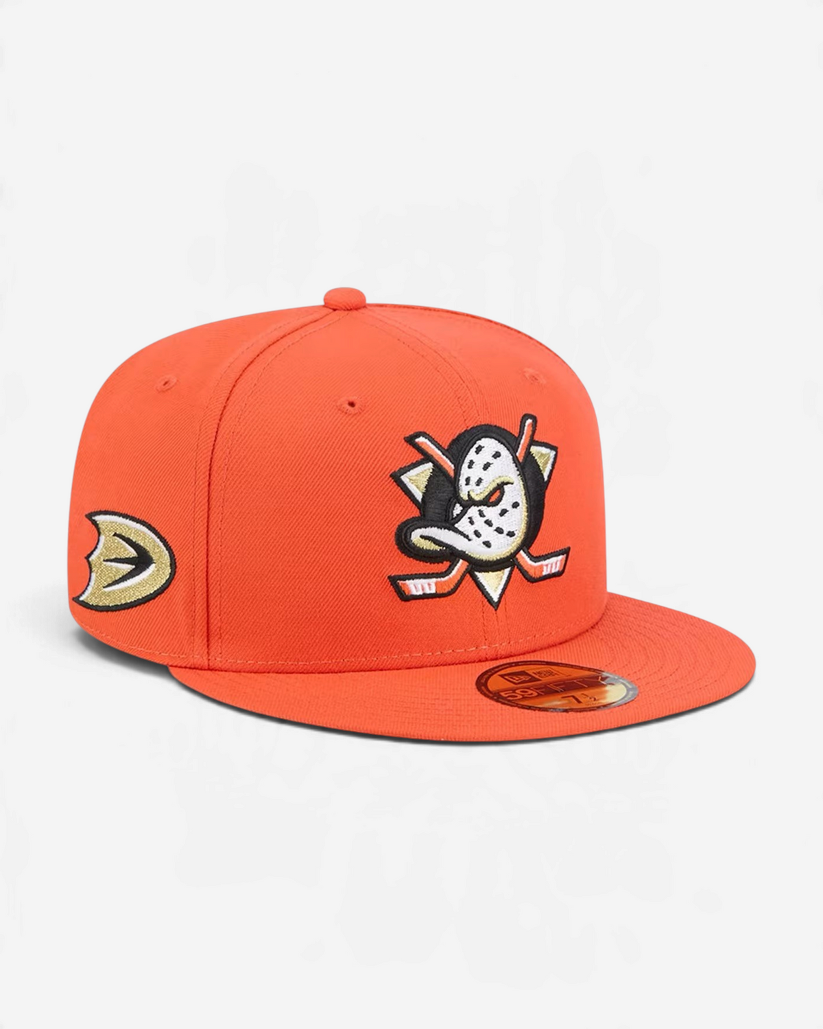Astrofat orange Anaheim Ducks 59FIFTY fitted cap with flat visor, embroidered team logo, and side patch detail.