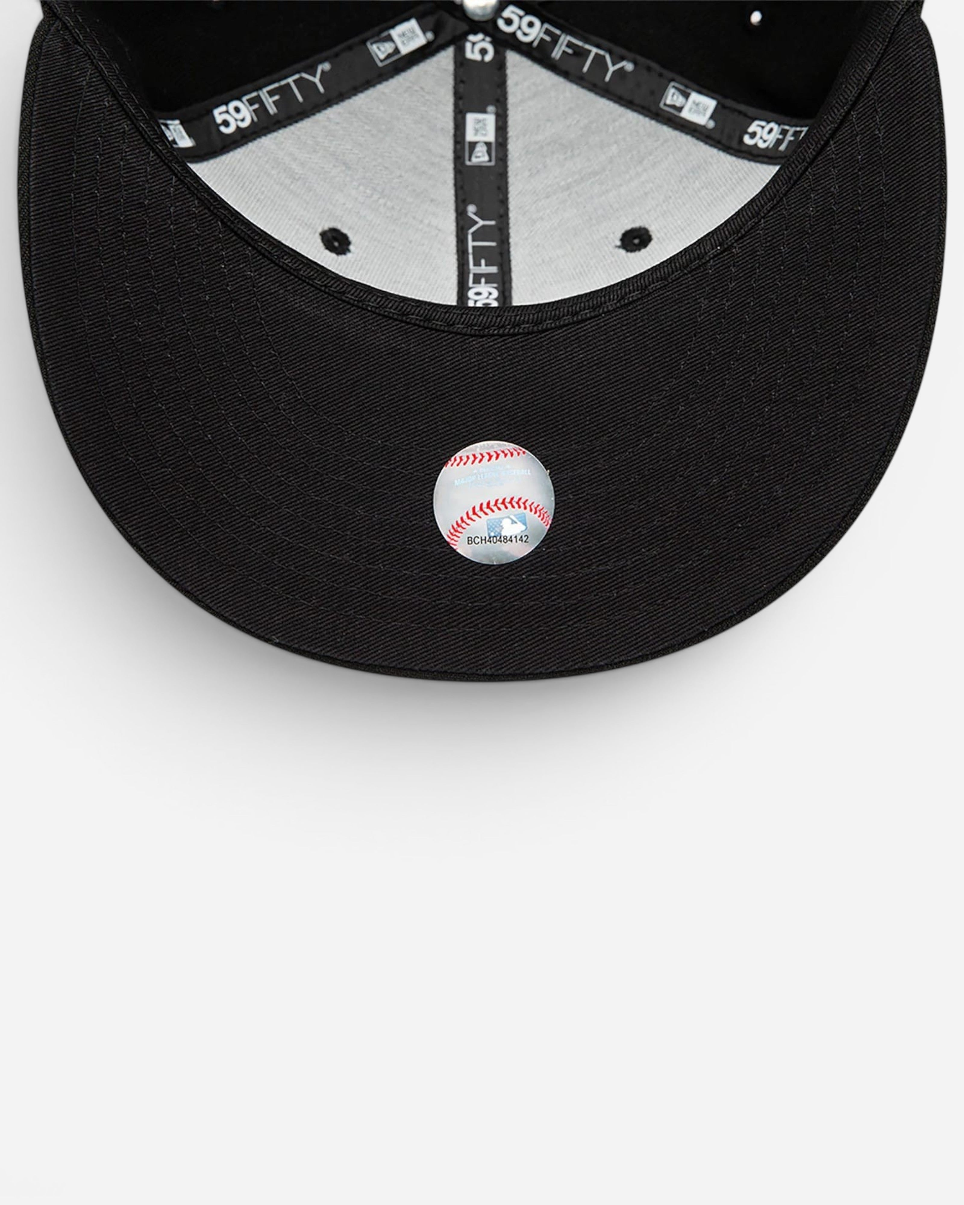 Astrofat 59FIFTY Atlanta Braves cap interior showing the structured crown, flat visor, and official MLB hologram sticker