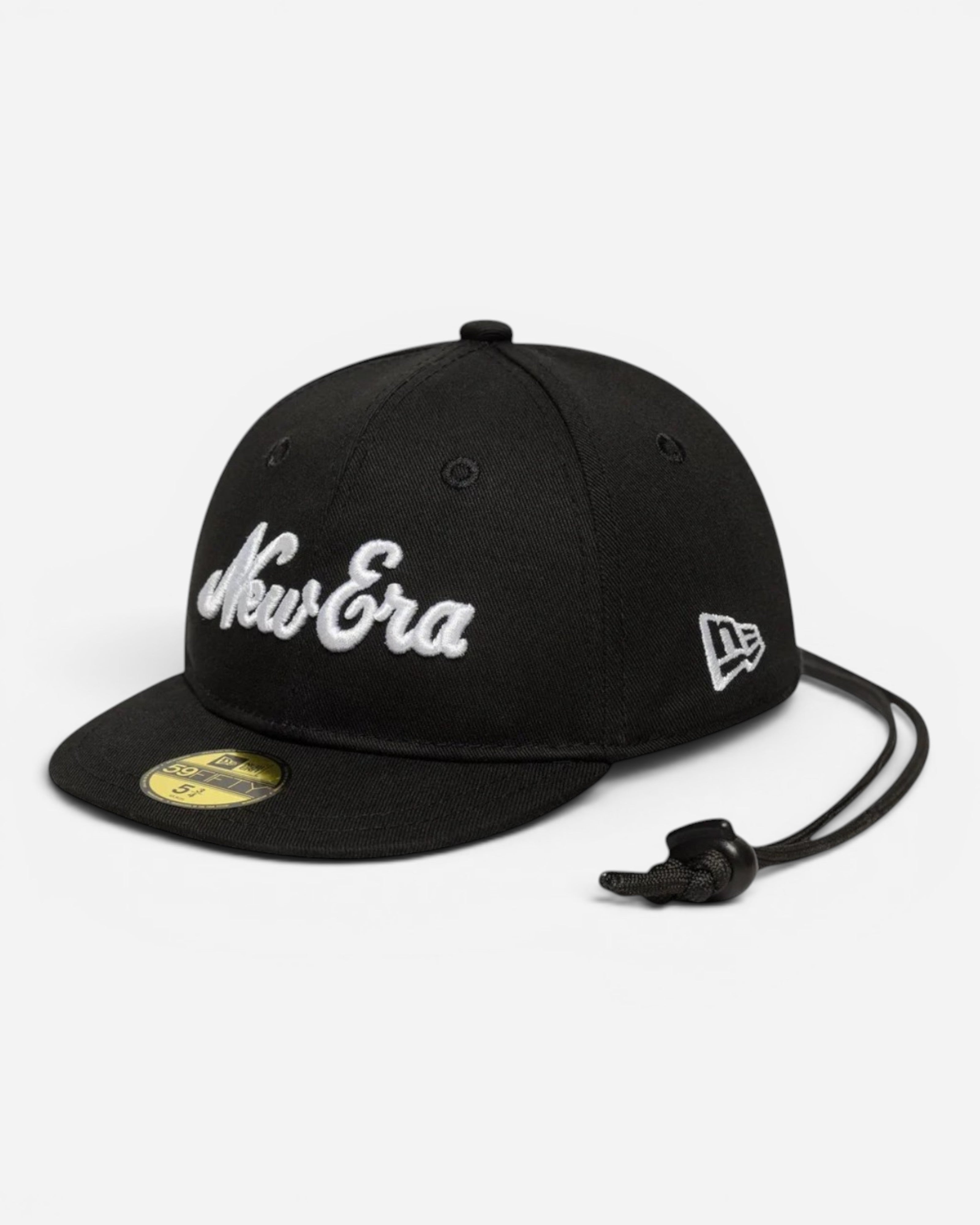 Astrofat black New Era mini cap keychain featuring white embroidered branding and a durable zinc metal attachment.
