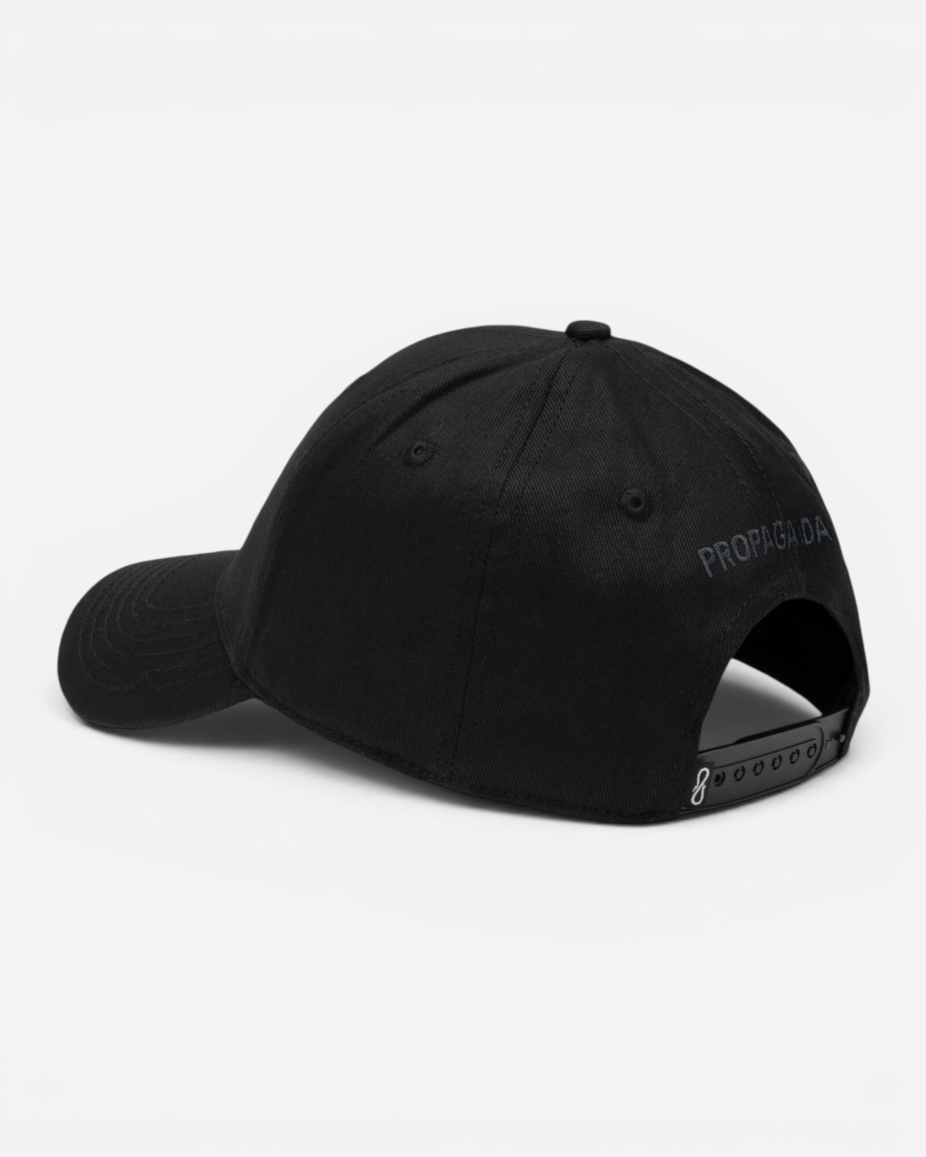 Astrofat black cotton snapback cap with Propaganda logo embroidery on the back and adjustable plastic strap closure.