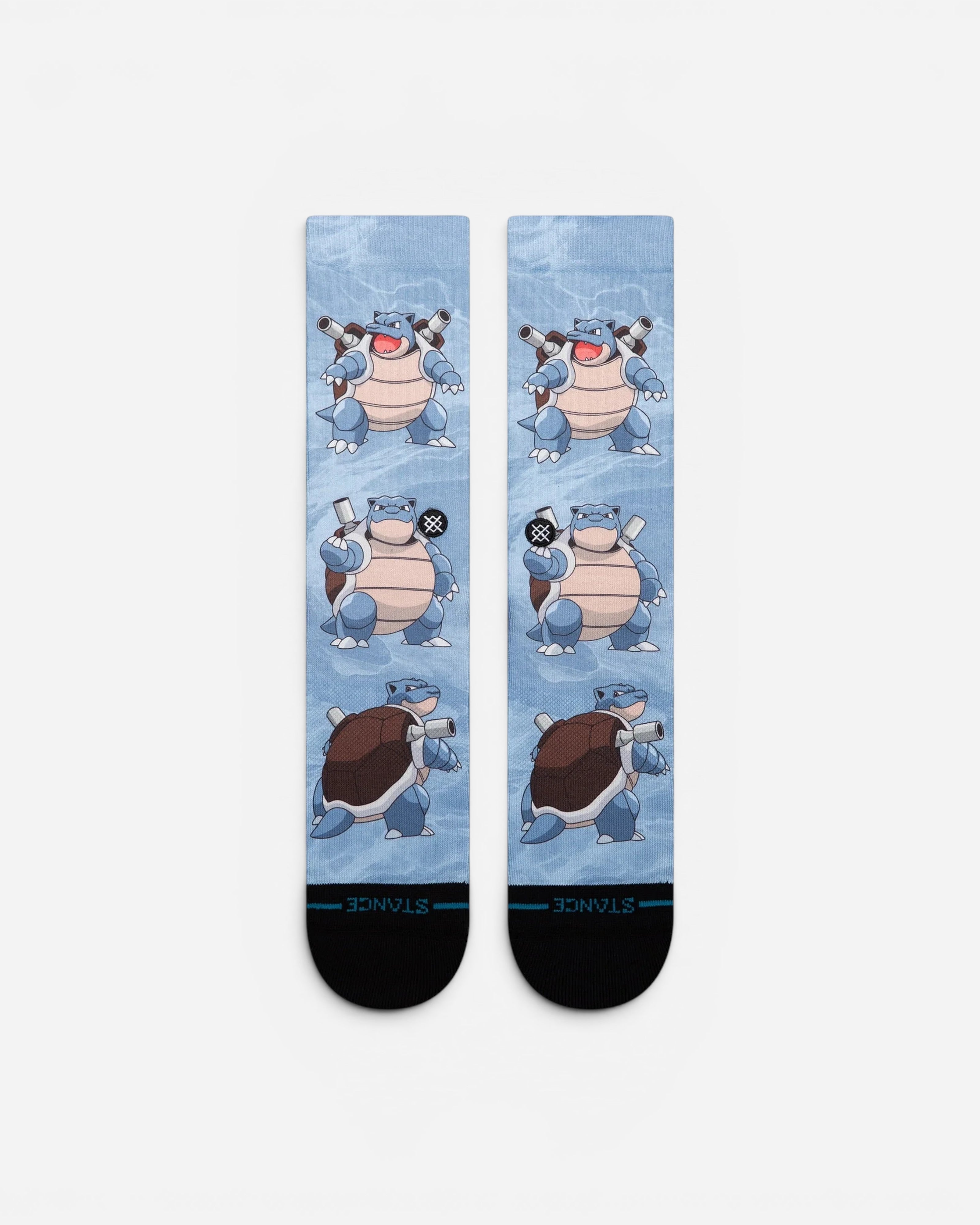 Astrofat Pokemon Blastoise crew socks in light blue with an all-over character print and black heel and toe details.
