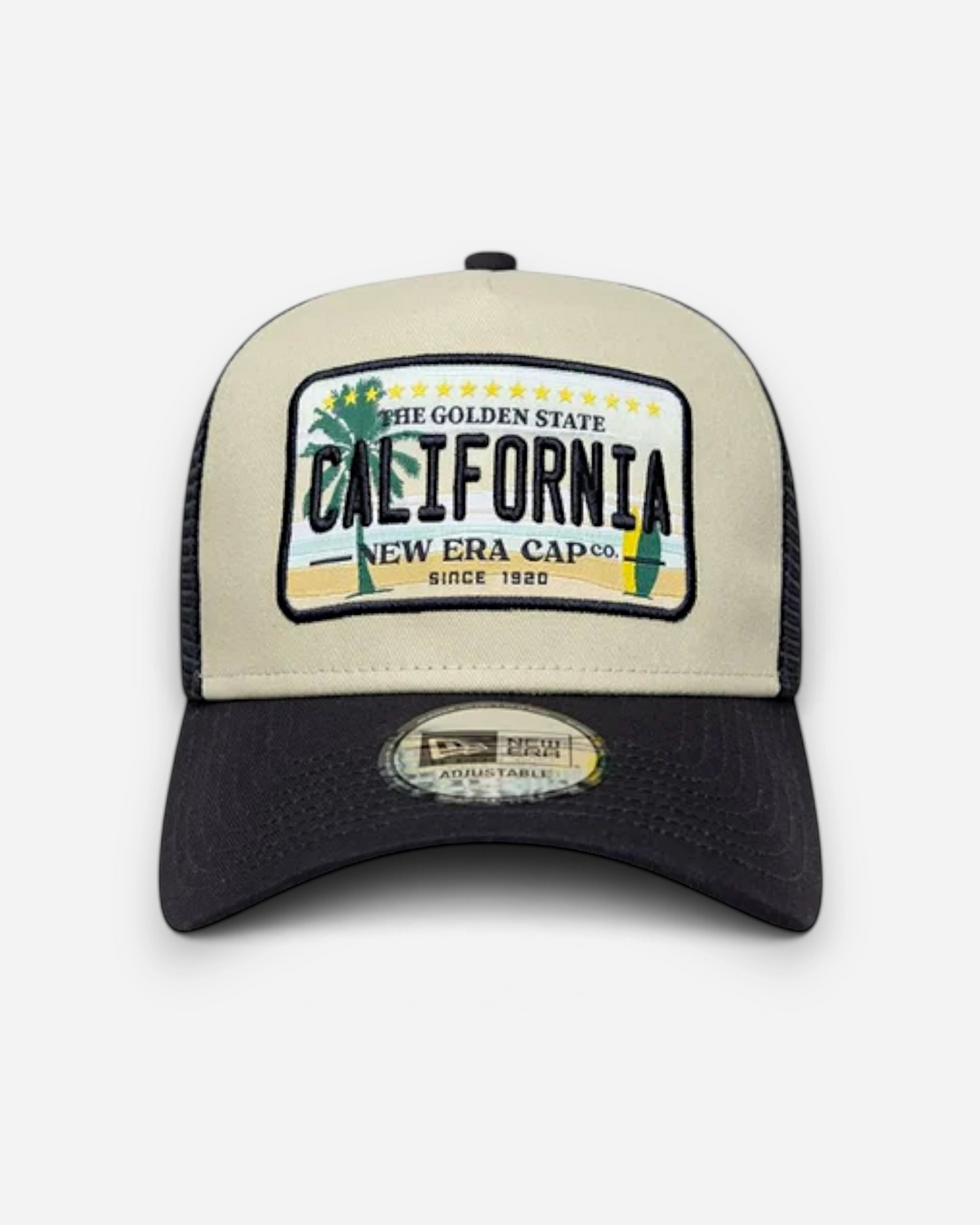 Astrofat 9FORTY trucker cap in cream and navy with a California graphic patch, curved visor, and mesh back.