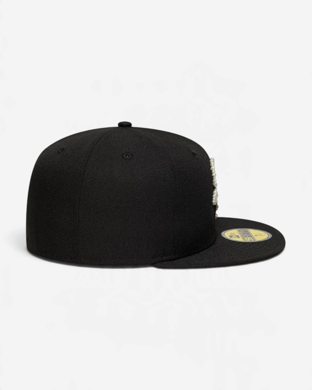 Astrofat black 59FIFTY fitted cap featuring a Chicago White Sox logo embellished with faux pearls and a flat visor.