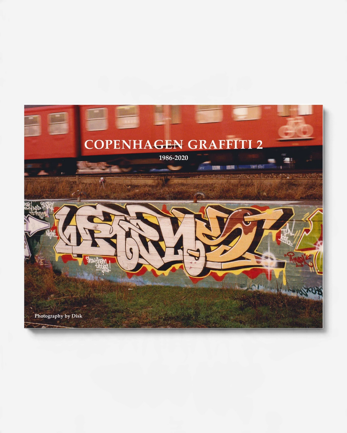 Astrofat Copenhagen Graffiti II 1986-2020 exhibition catalog featuring a train and graffiti wall art cover