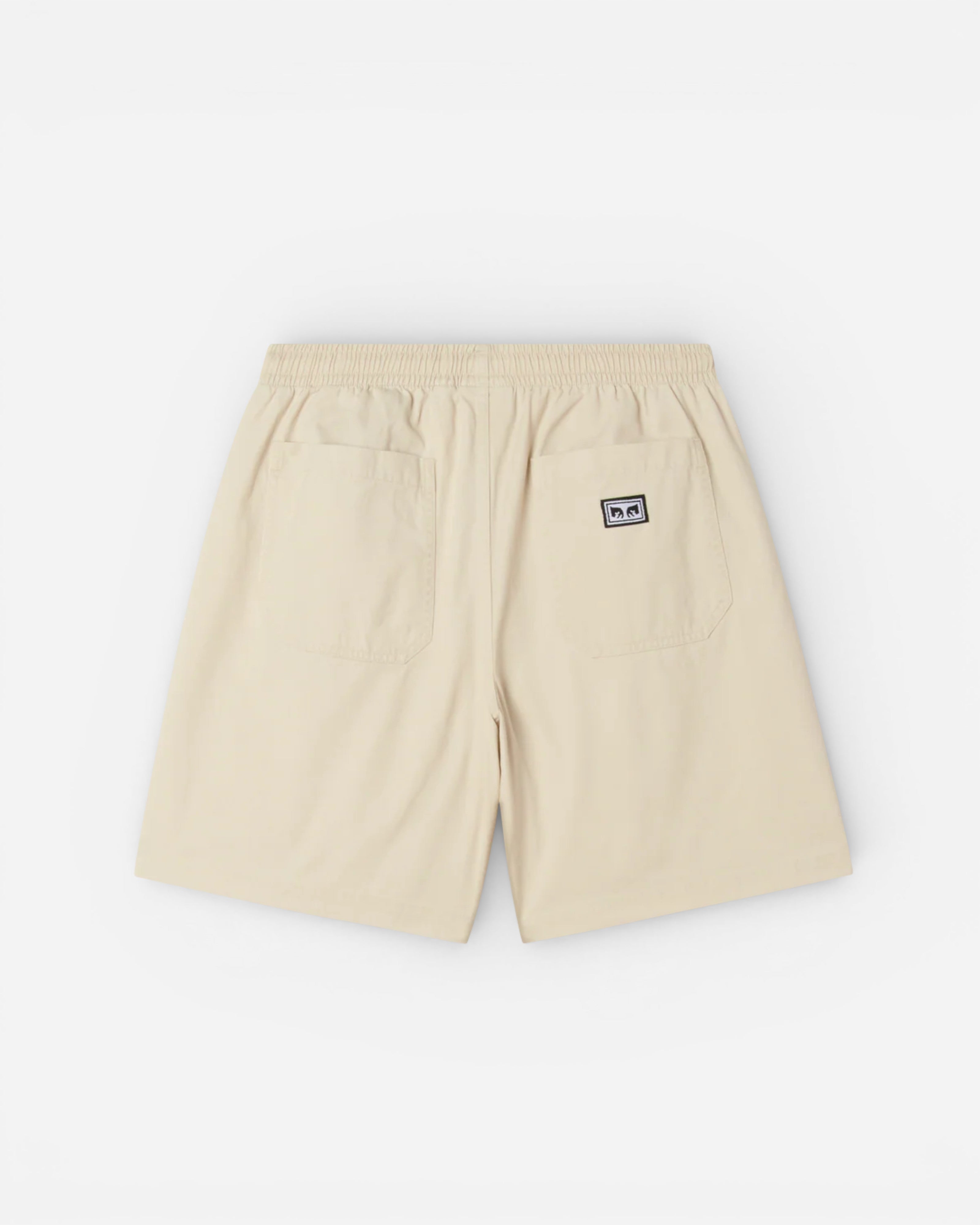 Astrofat Theo Easy Short Brich Faded Wash, cream 100% cotton shorts with elastic waistband and drawstring, back pockets, and Obey logo tag.