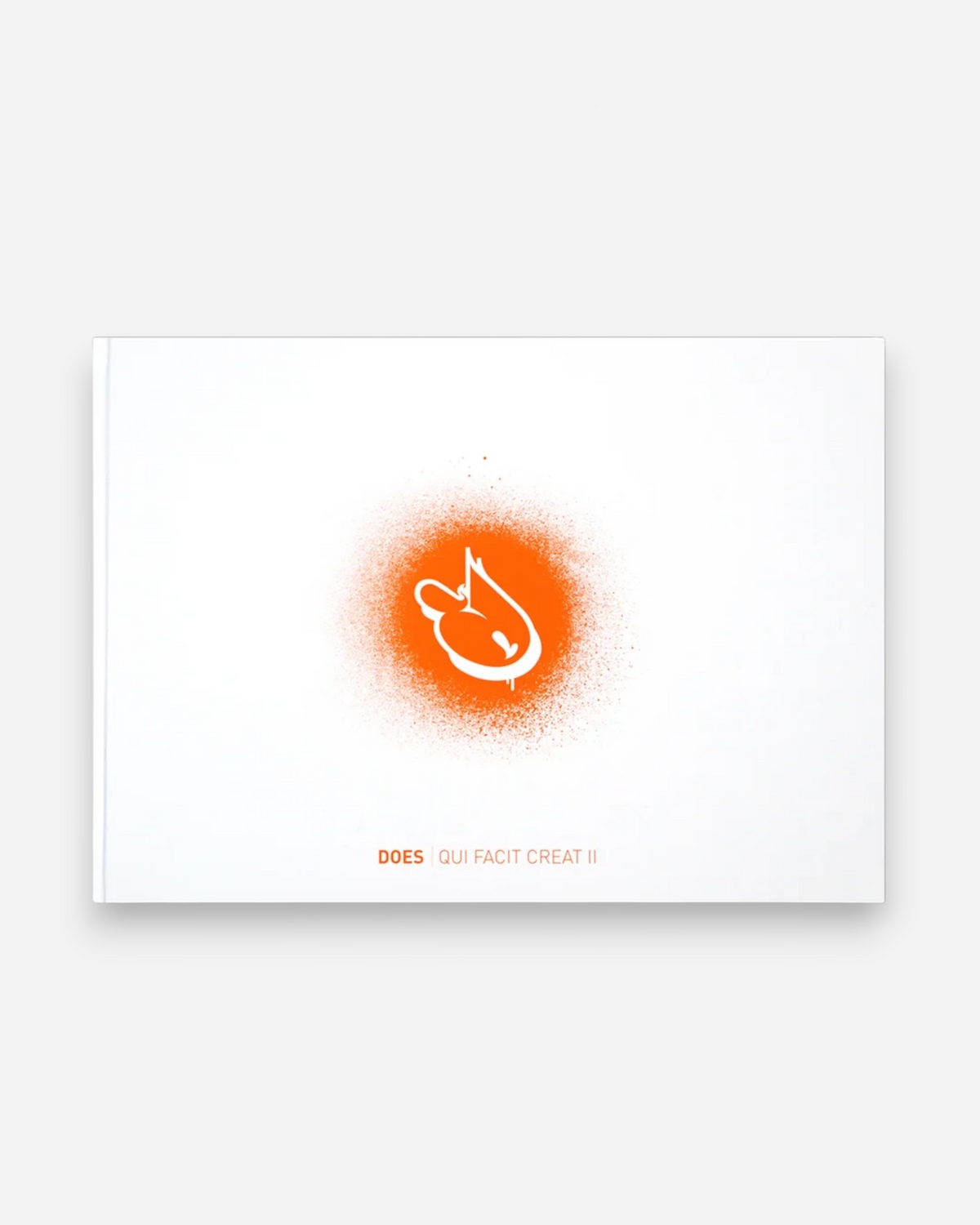 Astrofat DOES First 20 Years hardcover art book featuring a minimalist orange spray paint graphic on a white cover.