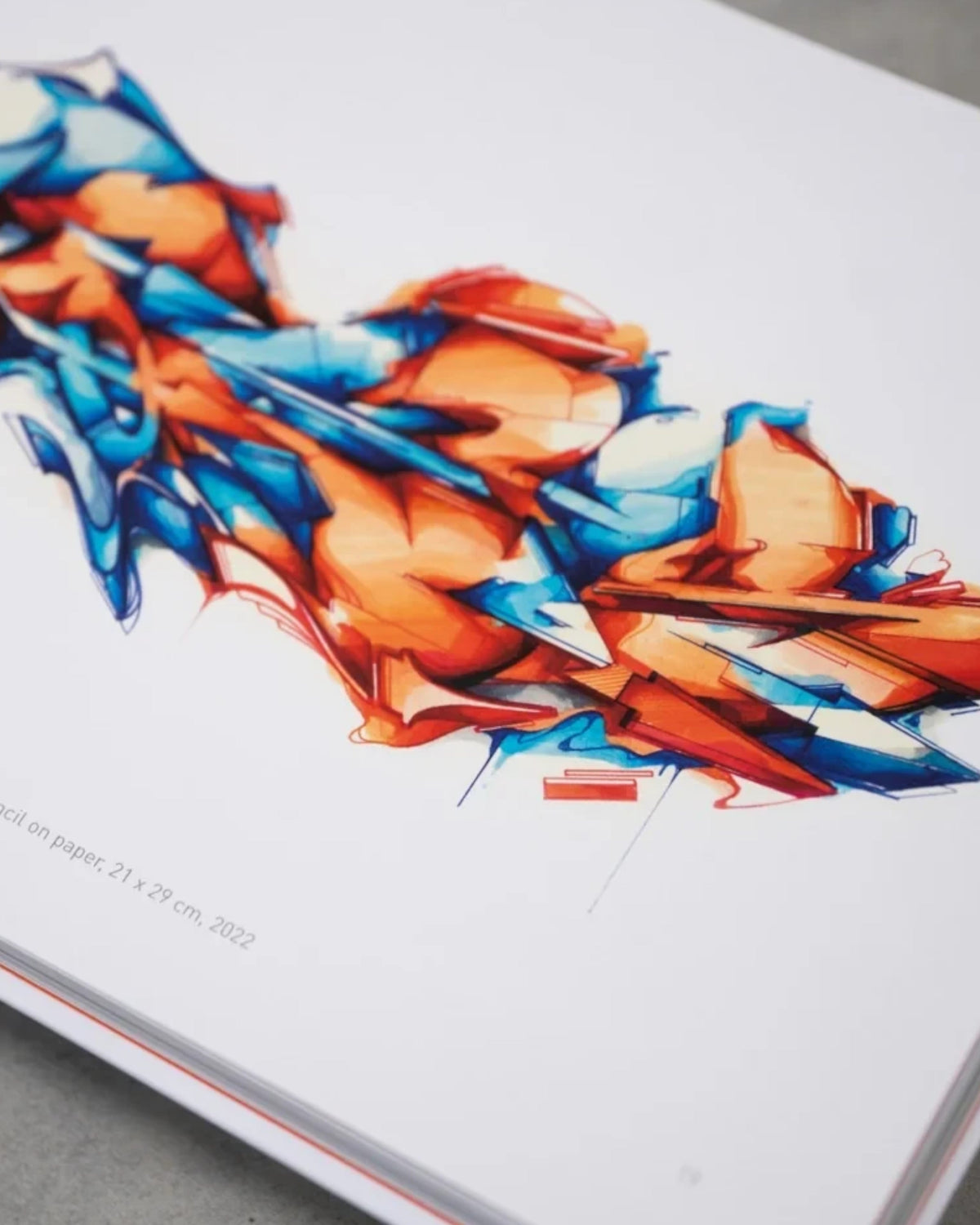 Astrofat DOES First 20 Years book page featuring a vibrant blue and orange graffiti sketch by the artist.