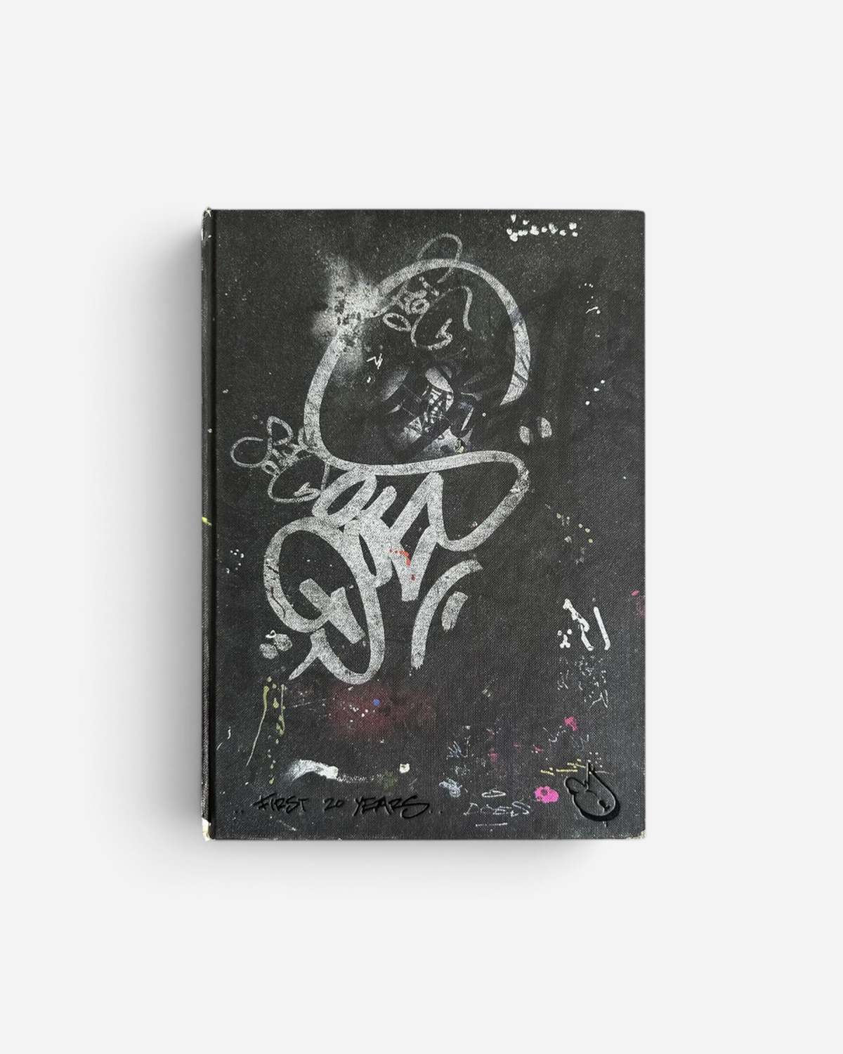 Astrofat DOES First 20 Years hardcover graffiti art book featuring a black cover with white spray paint tag design