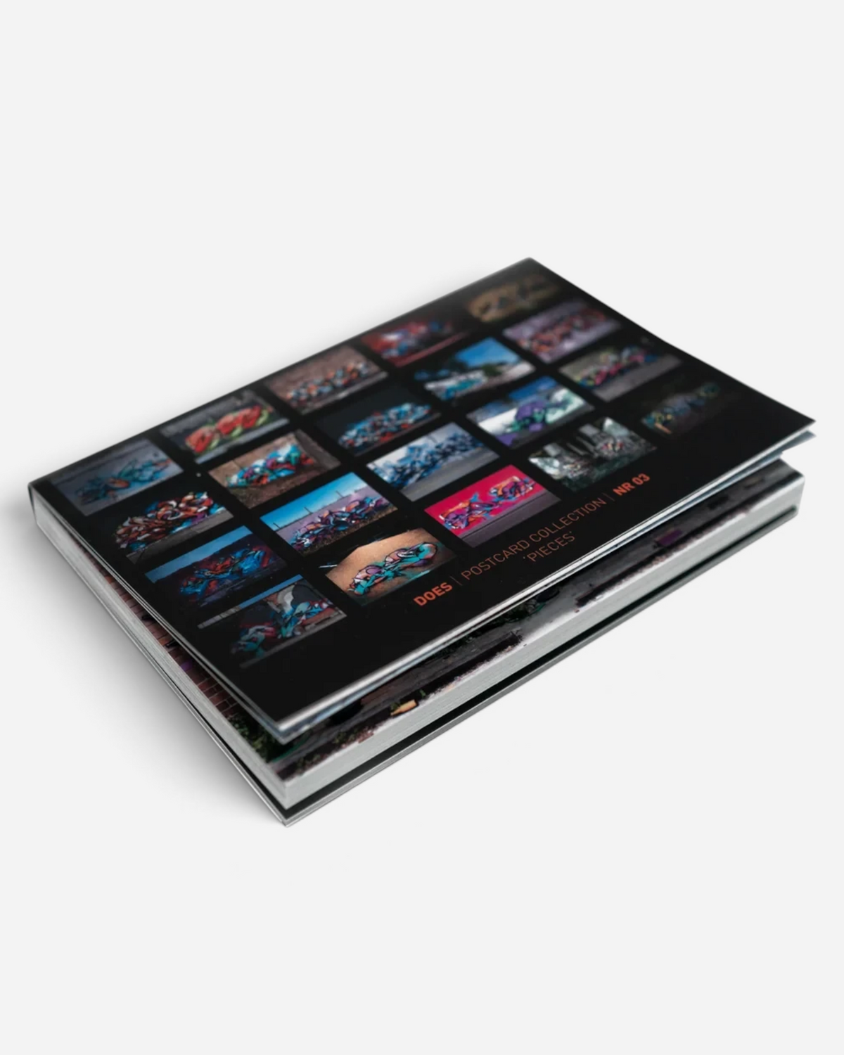 Astrofat DOES Pieces N°3 limited edition postcard set featuring 20 unique graffiti art prints in a booklet format.