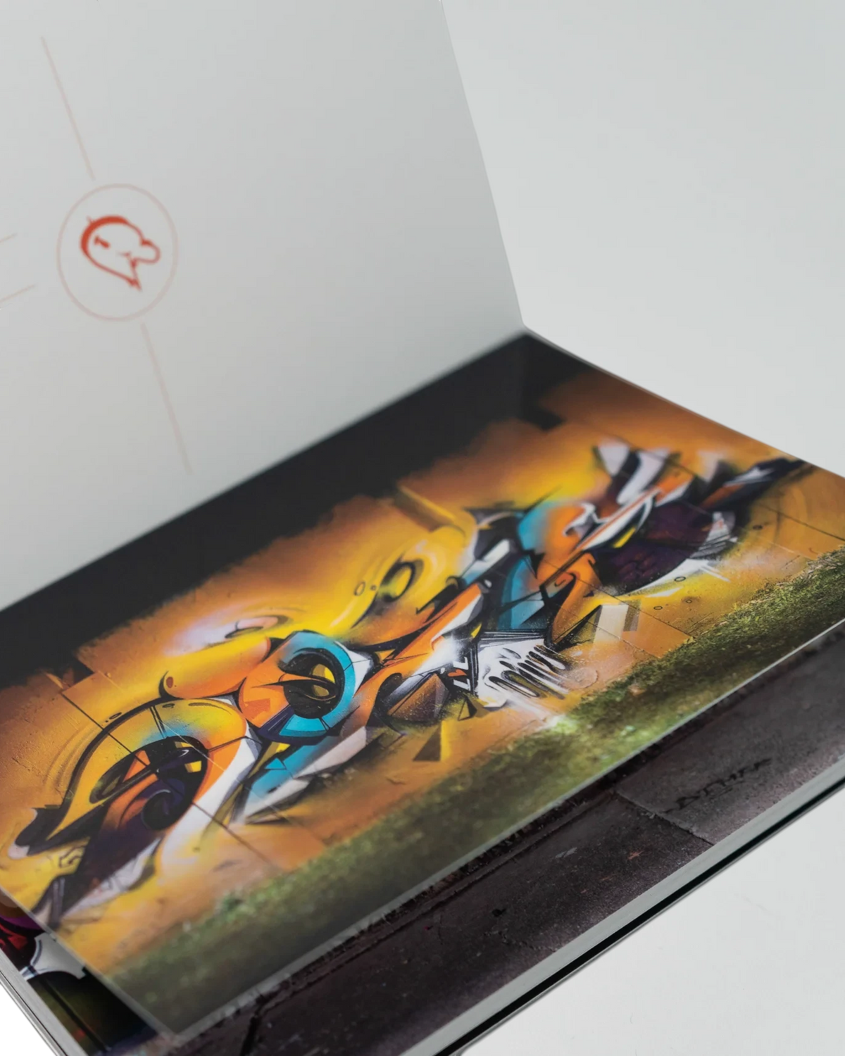 Astrofat DOES Pieces postcard set featuring vibrant graffiti art prints in a bound booklet format.