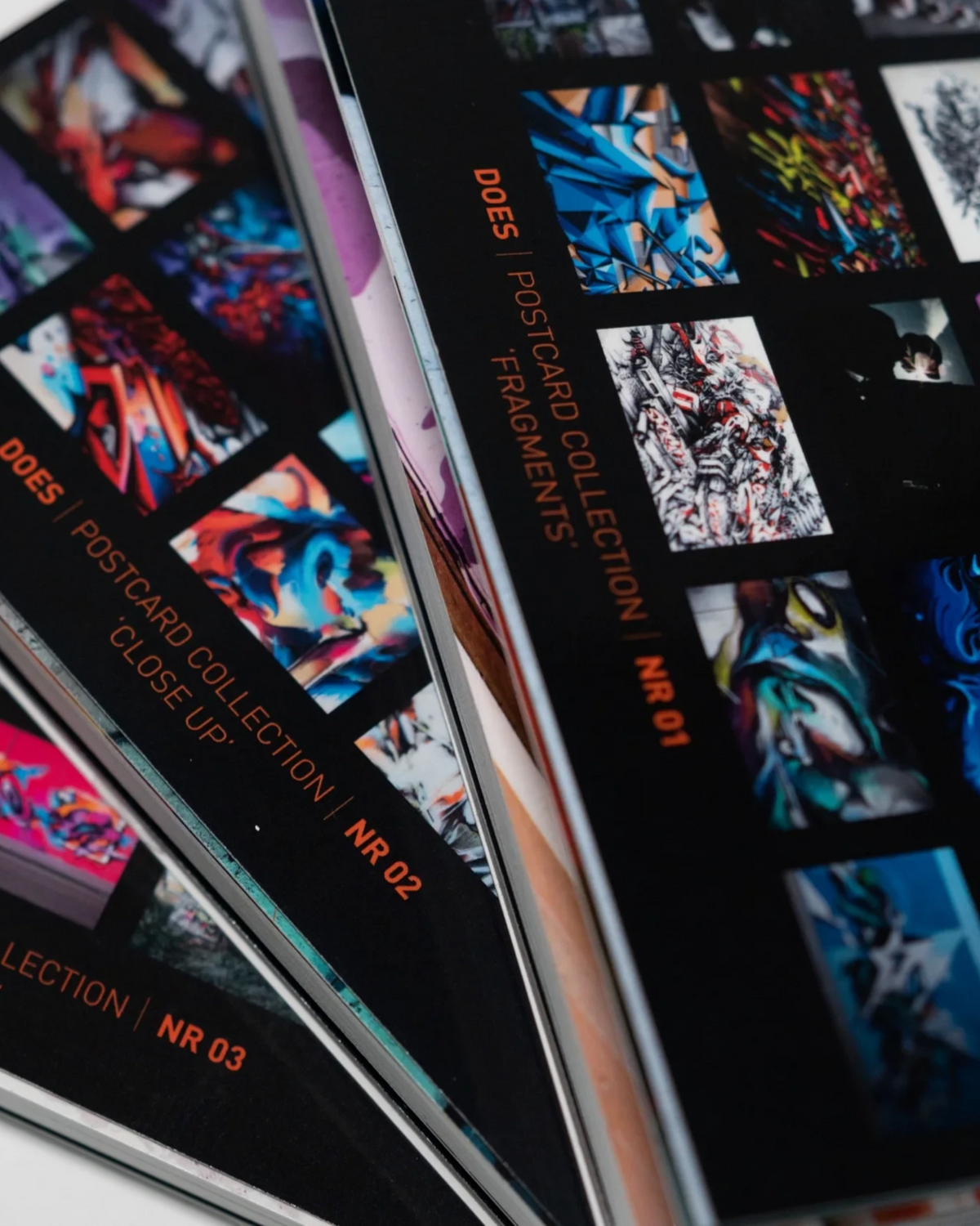 Astrofat limited edition DOES postcard set featuring vibrant graffiti art prints in a numbered collection of 20