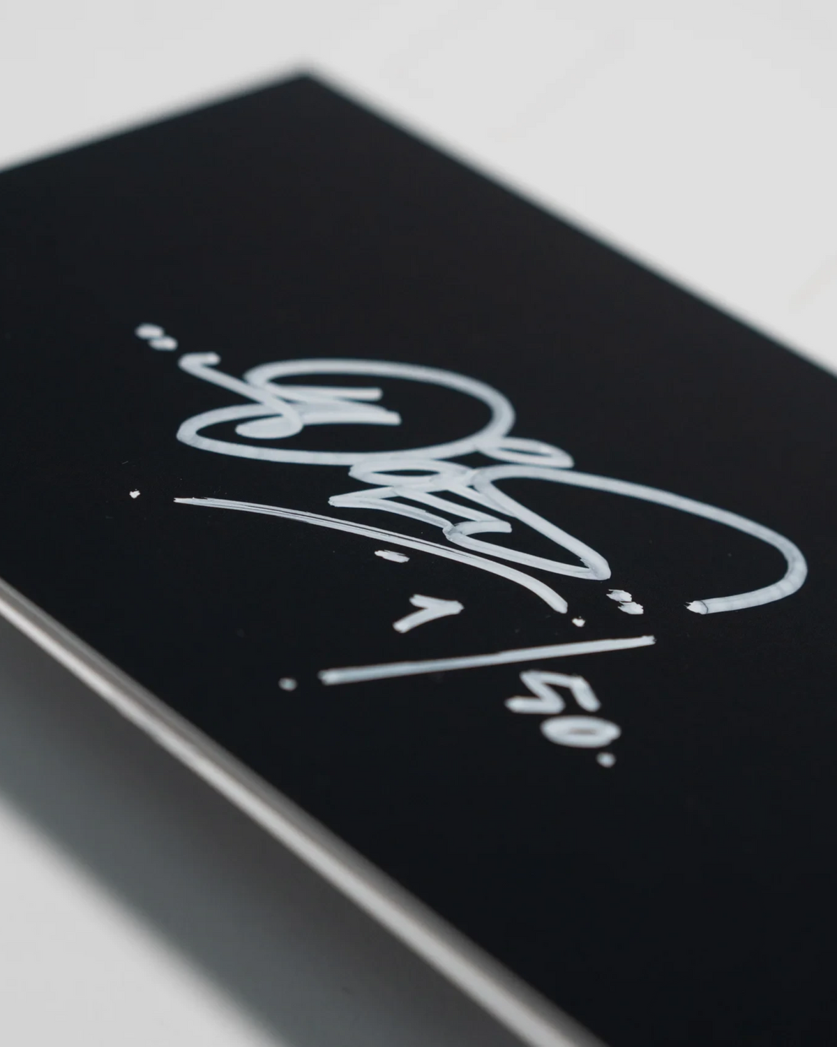 Astrofat limited edition DOES postcard set featuring a black card with a white hand-signed and numbered signature.