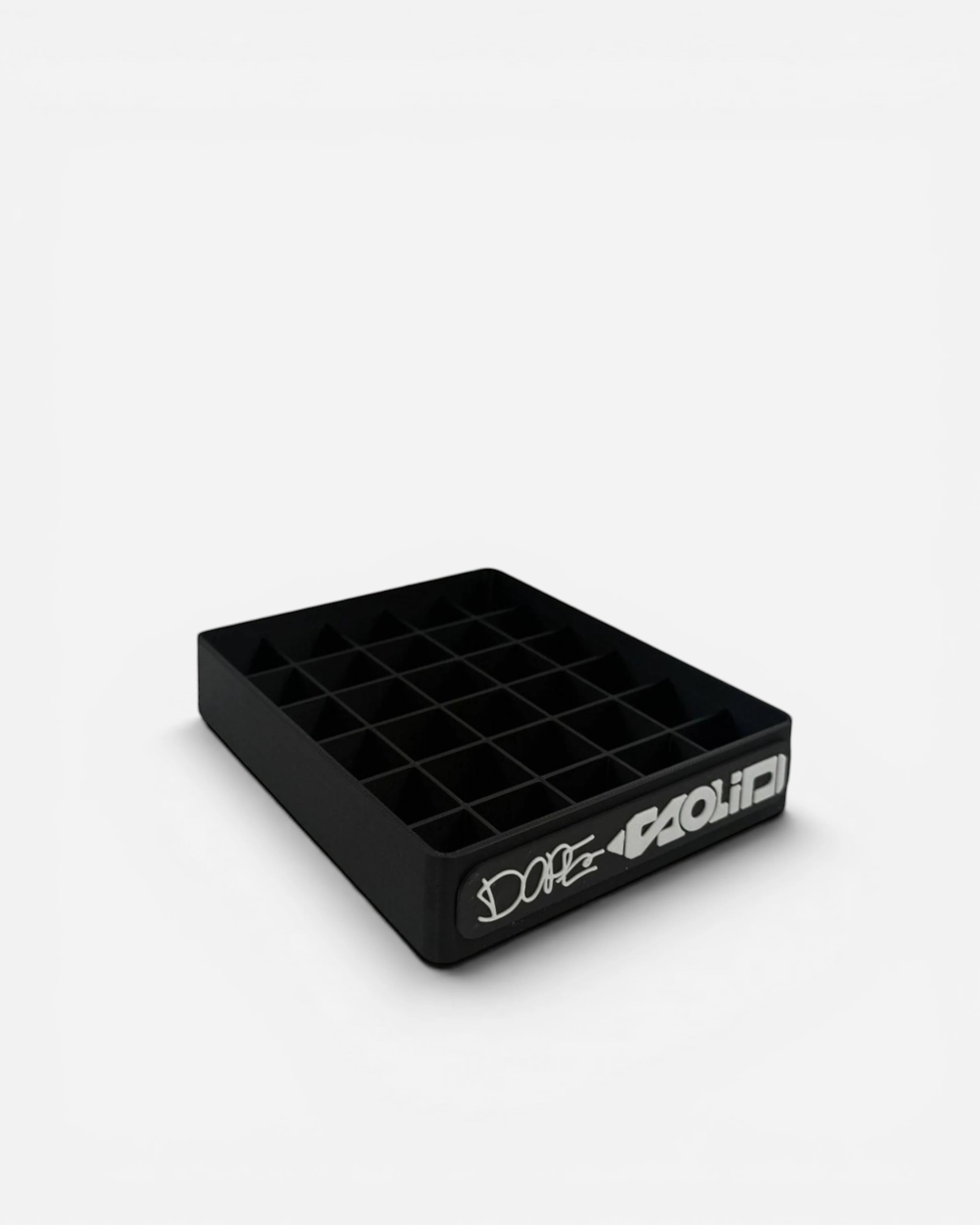Astrofat black plastic display stand for 30 Dope Solid markers, featuring a 5x6 grid and embossed logo.