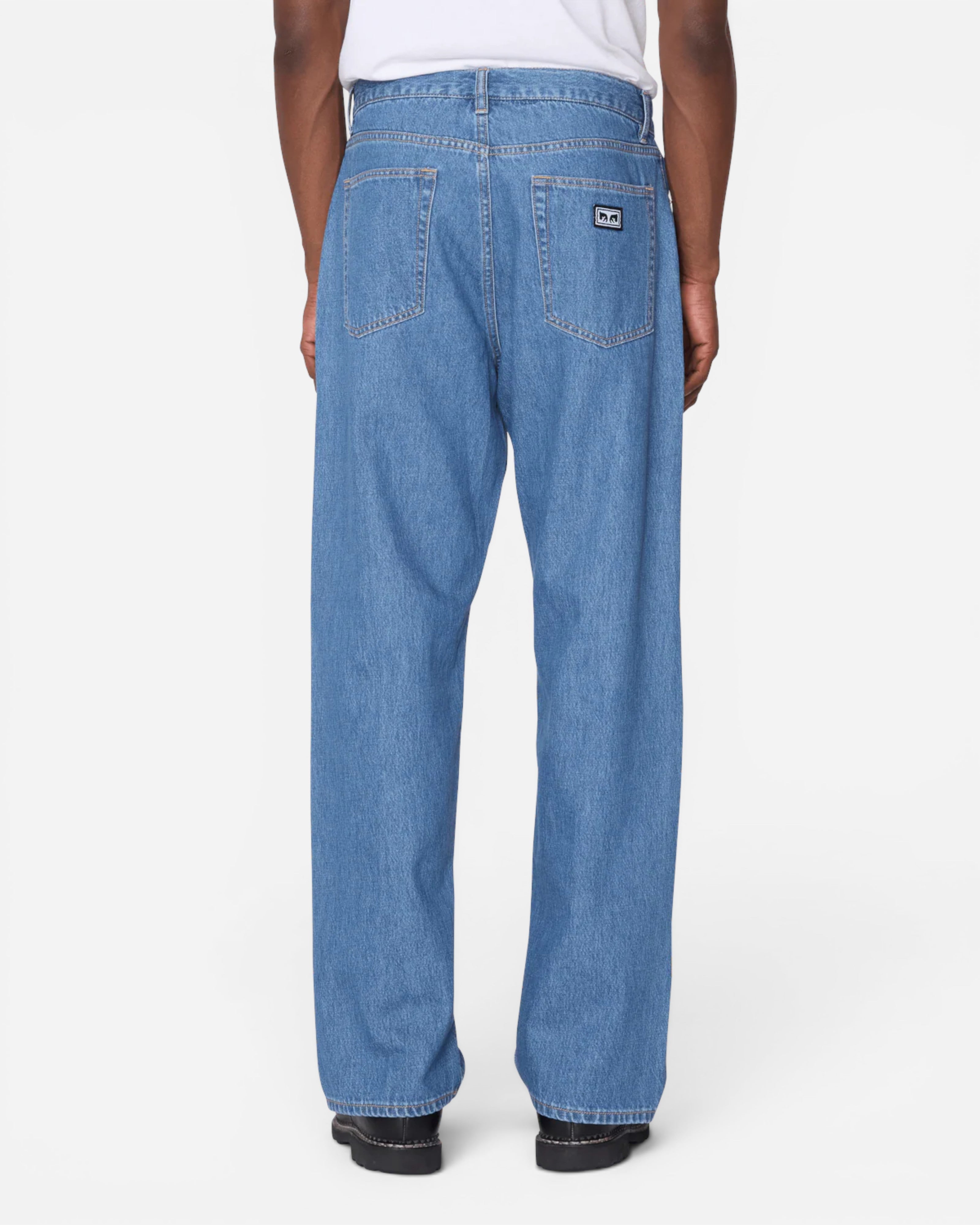 Astrofat Emerson Denim Pant in Salty Blue Stone Wash. Relaxed fit, 100% cotton 10 oz denim with a tapered leg and 5-pocket styling.