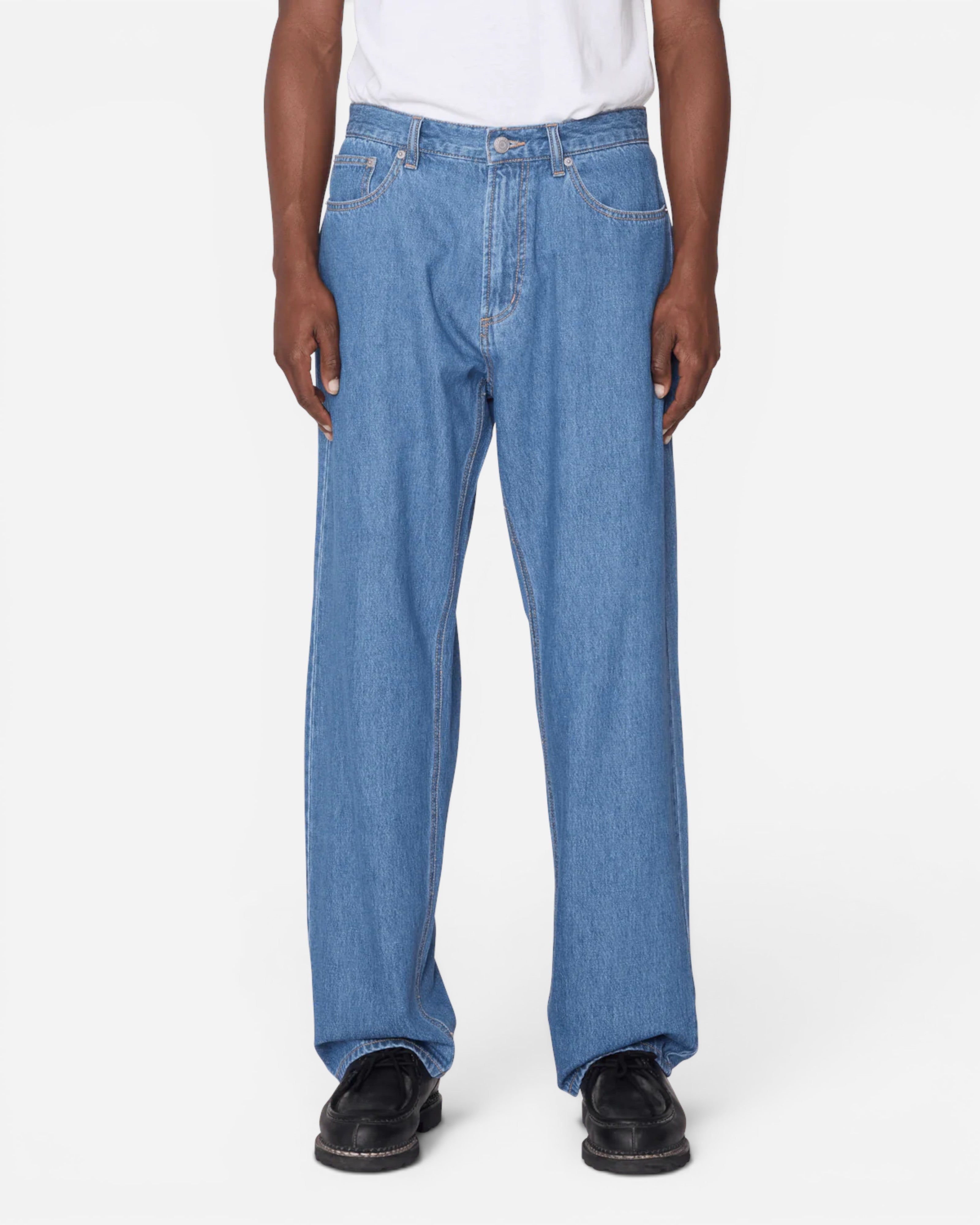 Astrofat Emerson Denim Pant in Salty Blue Stone Wash. Relaxed fit, 100% cotton, 5-pocket style with tapered leg.