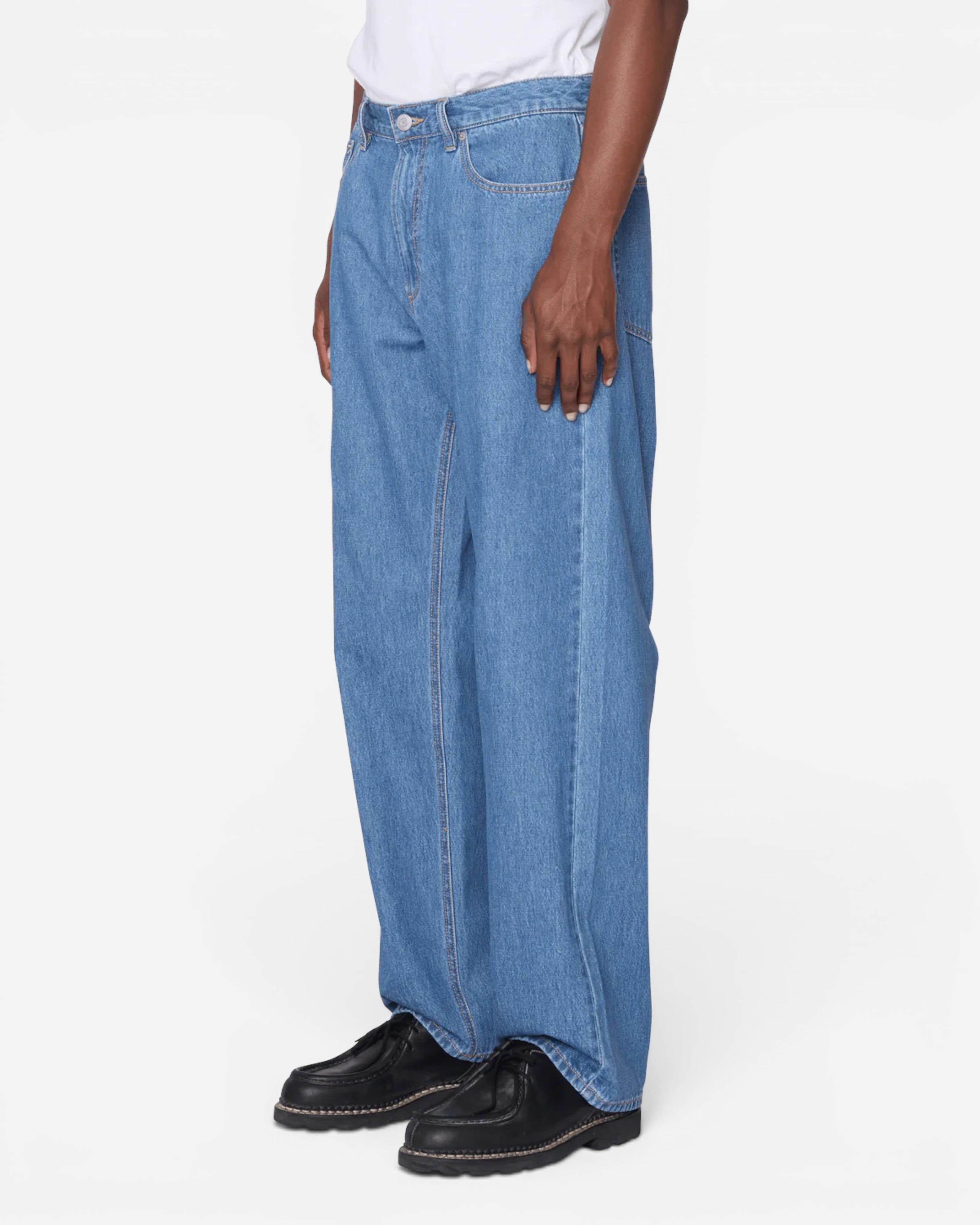 Astrofat Emerson Denim Pant in Salty Blue Stone Wash. Relaxed fit, 100% cotton 10 oz denim with a tapered leg and 5-pocket styling.