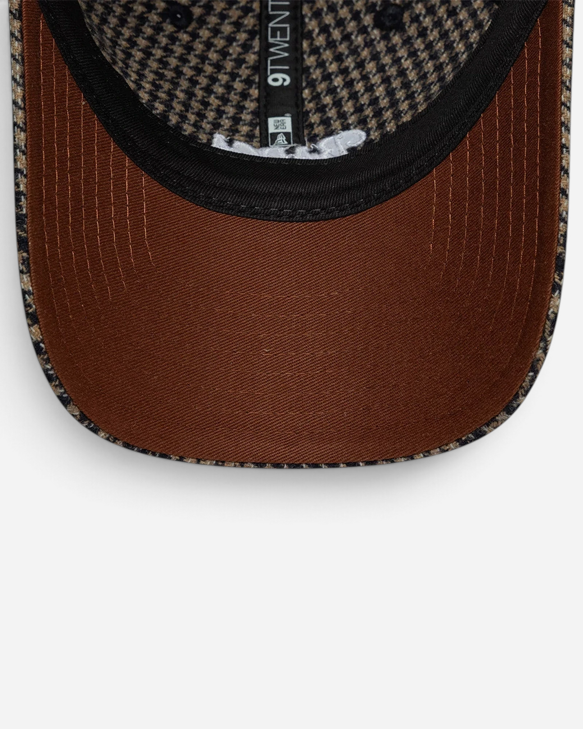Astrofat 9TWENTY FC Barcelona cap featuring a brown houndstooth pattern and a solid brown curved visor.