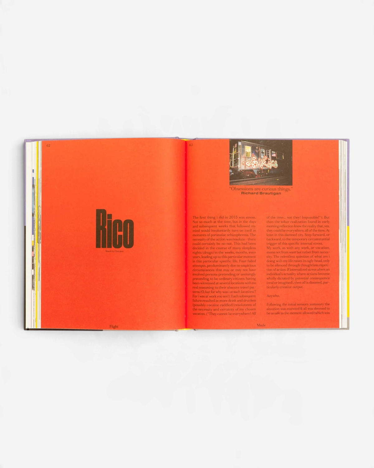 Astrofat Flight Mode 4 book open to a page with vibrant orange background, black typography, and a graffiti train photo.