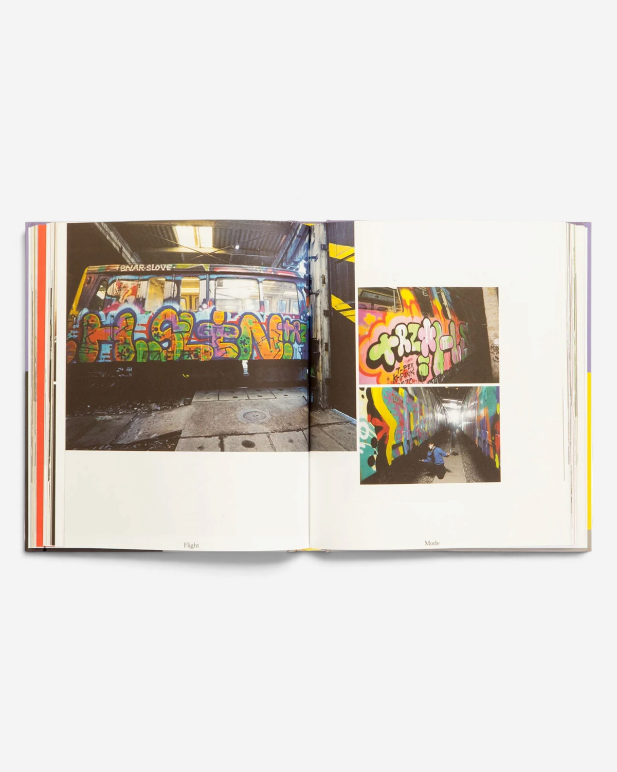 A spread from the Astrofat Flight Mode 4 book showing graffiti-covered subway trains and a person in a tunnel.