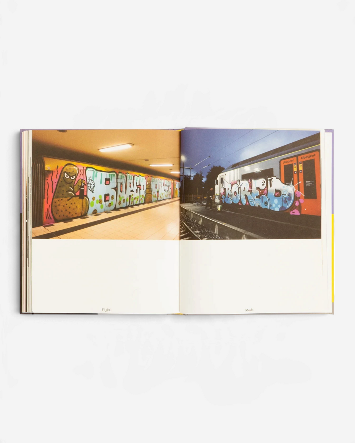 Astrofat Flight Mode 4 book spread showing graffiti art on subway walls and trains, blending human and AI creativity.