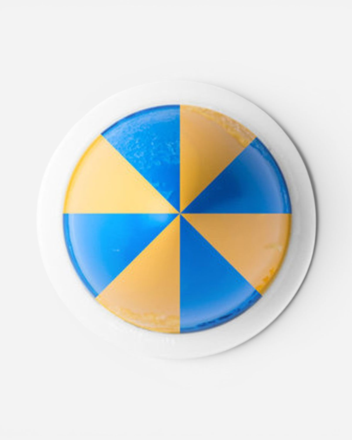 Astrofat HMX solid paint marker featuring a blue and gold geometric pie-chart design on a white background