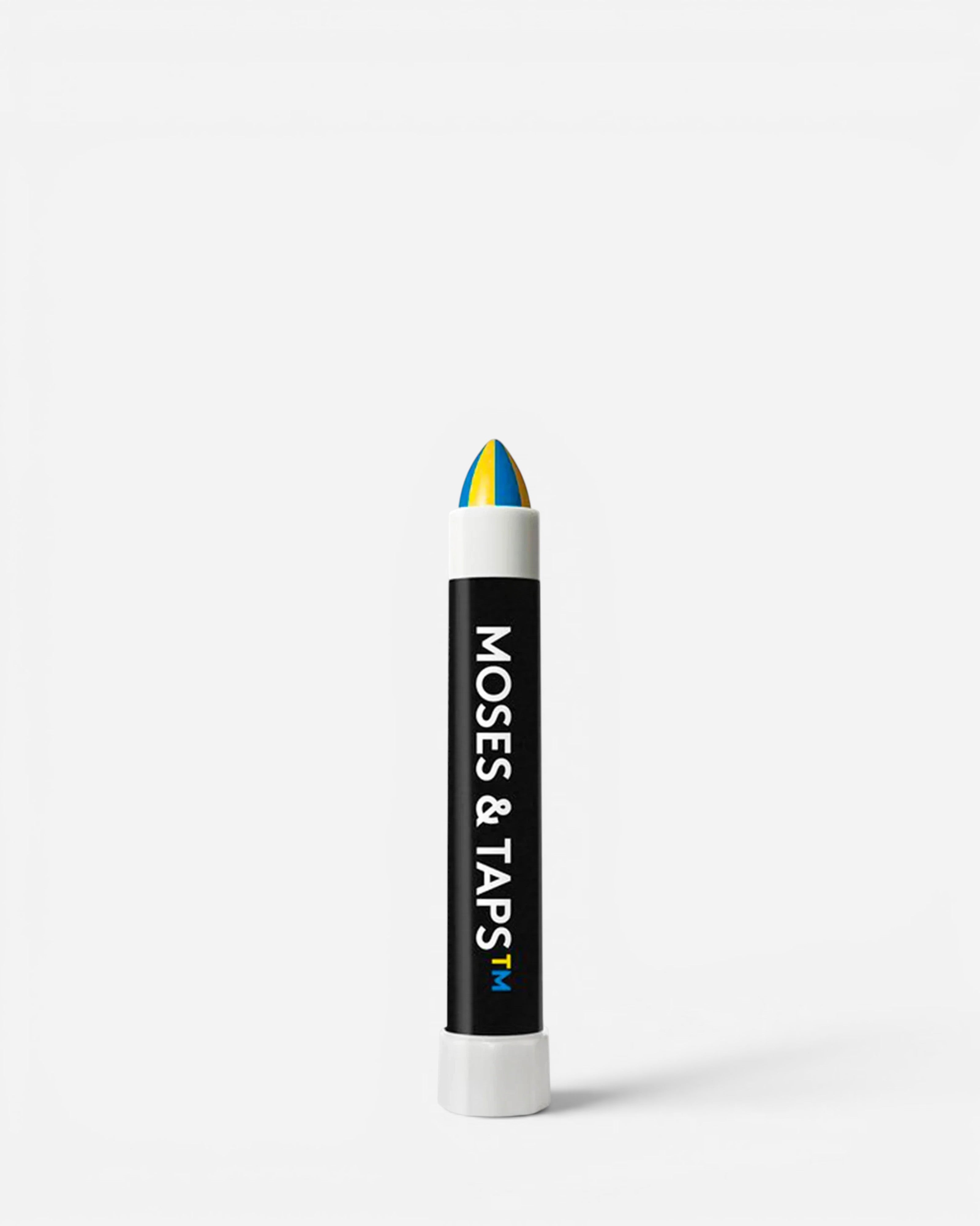Astrofat HMX solid paint marker by MOSES & TAPS featuring a multi-colored blue and yellow tip for permanent marking.