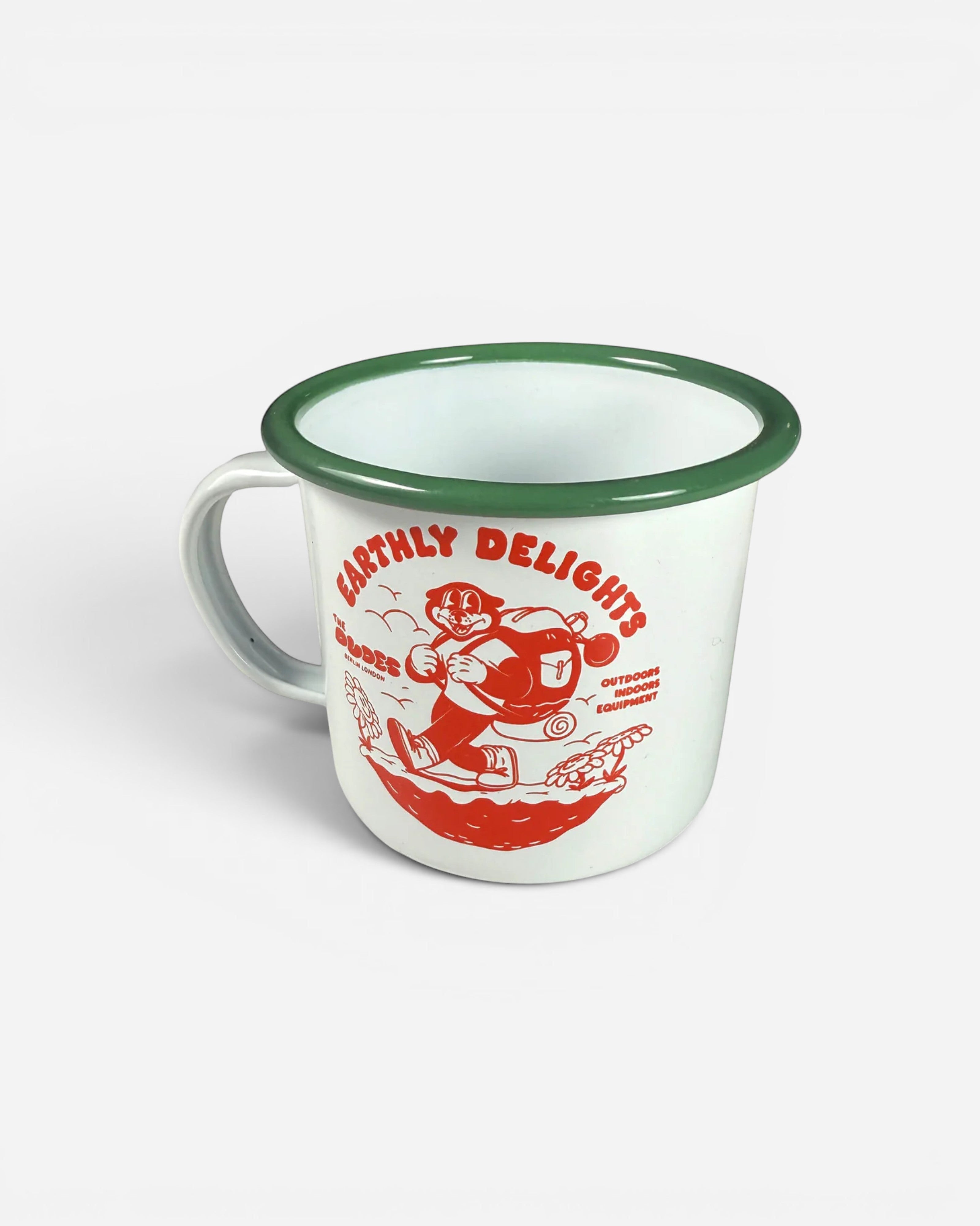 Astrofat ivory enamel mug with green rim, featuring a red cartoon character illustration and "Earthly Delights" text.