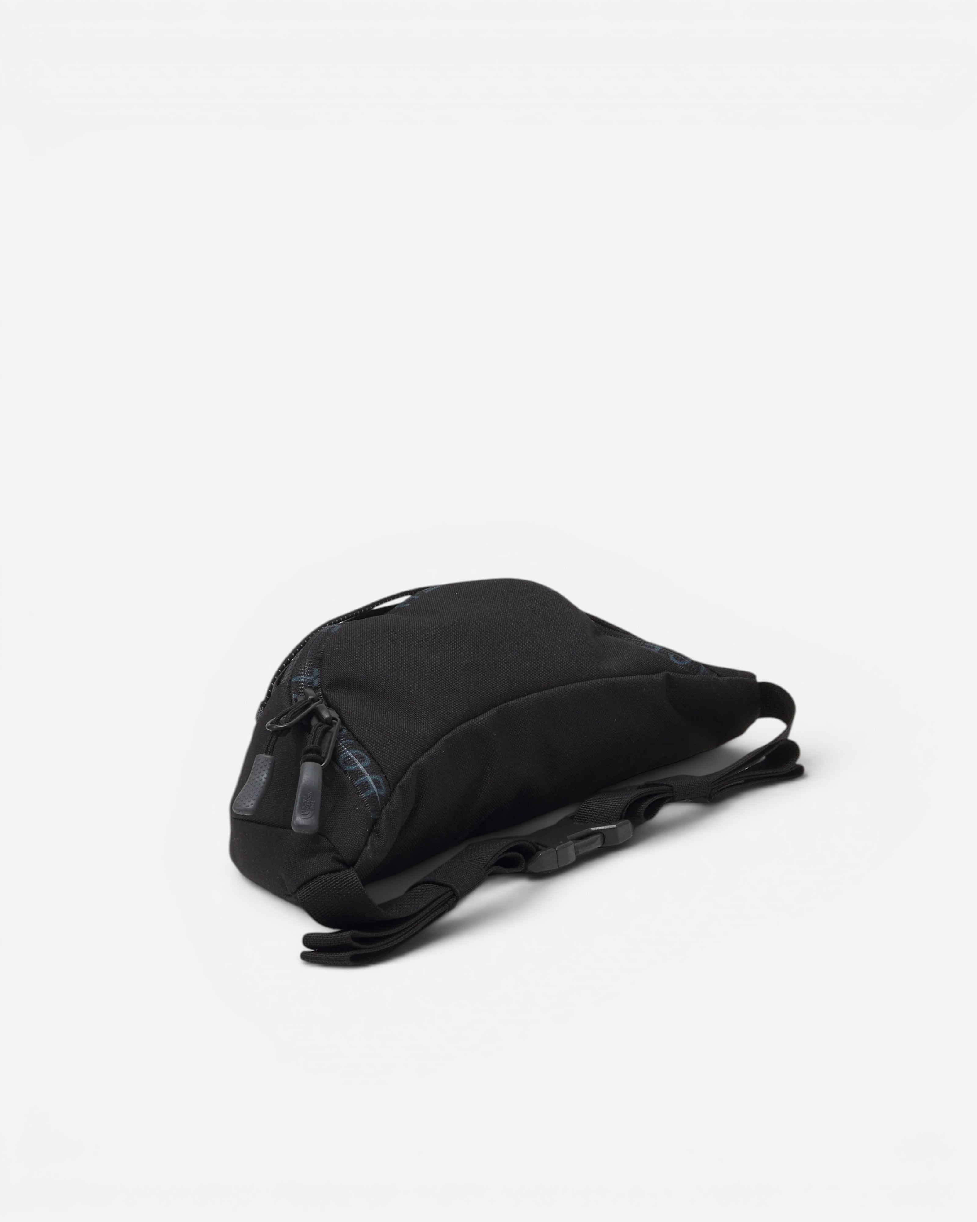 Astrofat Jester Lumbar bag in asphalt grey and black Base Camp material with adjustable strap and zippered pockets.