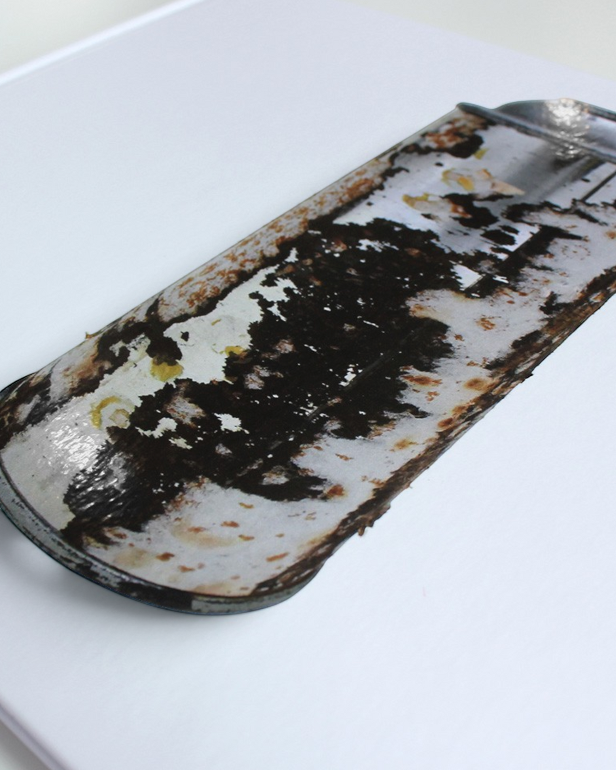Astrofat Kept Paper Labels limited edition art book featuring a rusted metal can graphic on a white cover
