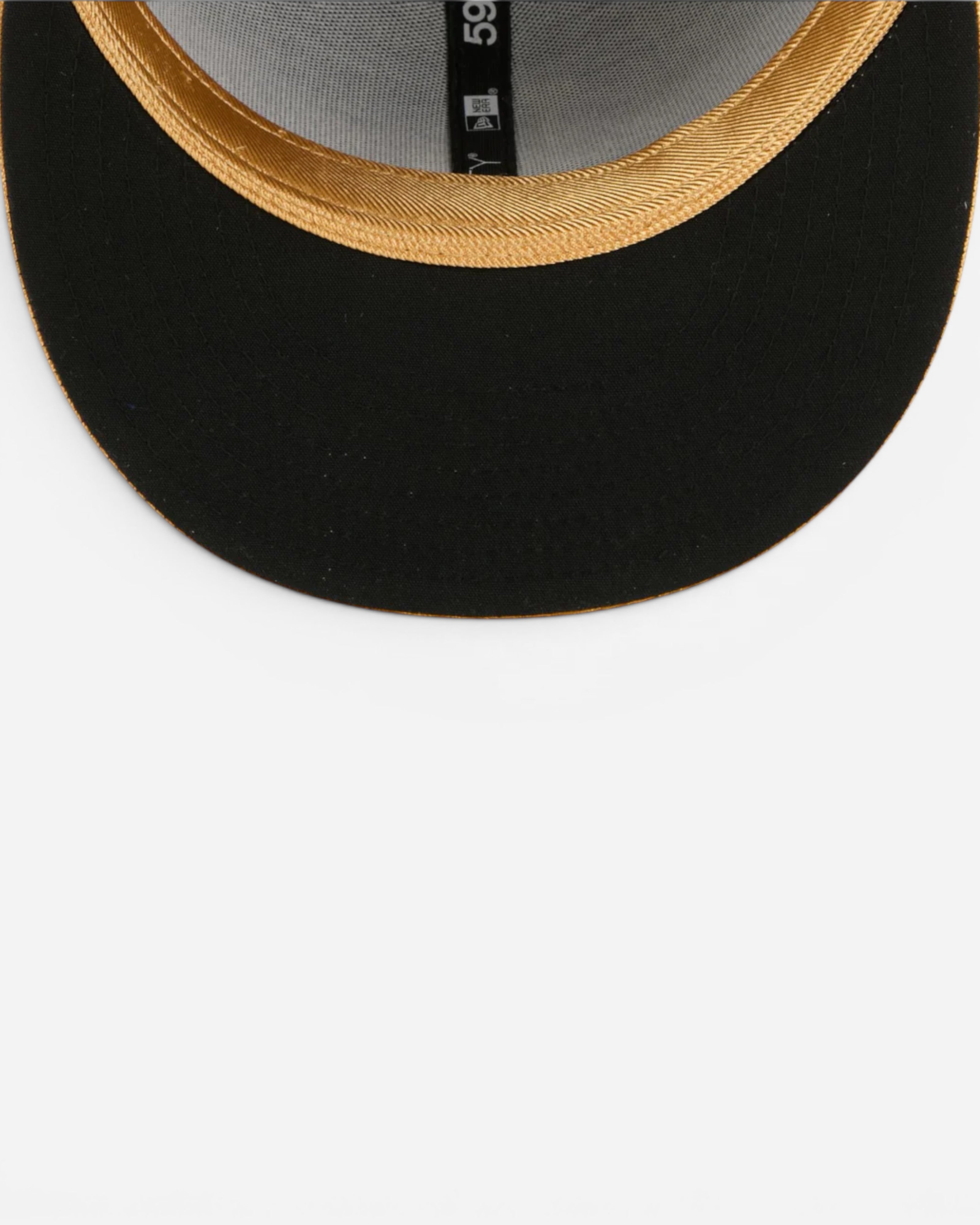 Astrofat dark blue 59FIFTY MLB Los Angeles Dodgers fitted baseball cap with gold brim detail.