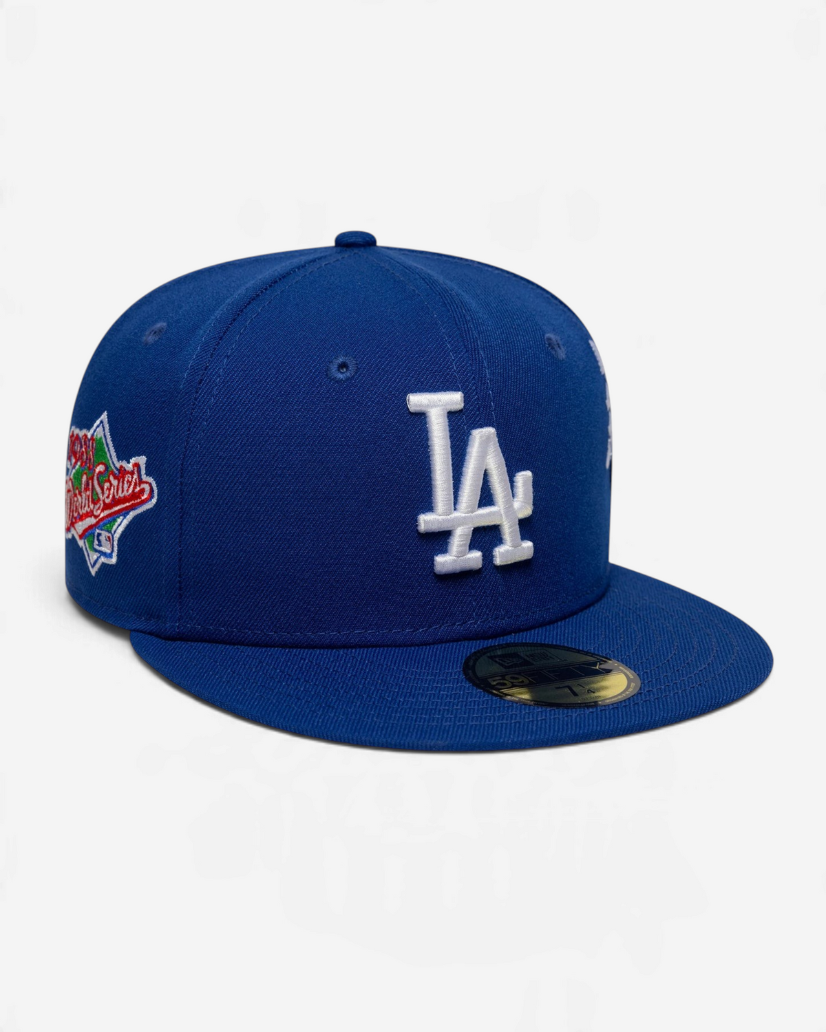 Astrofat blue 59FIFTY LA Dodgers fitted cap with white front logo, World Series side patch, and flat visor.