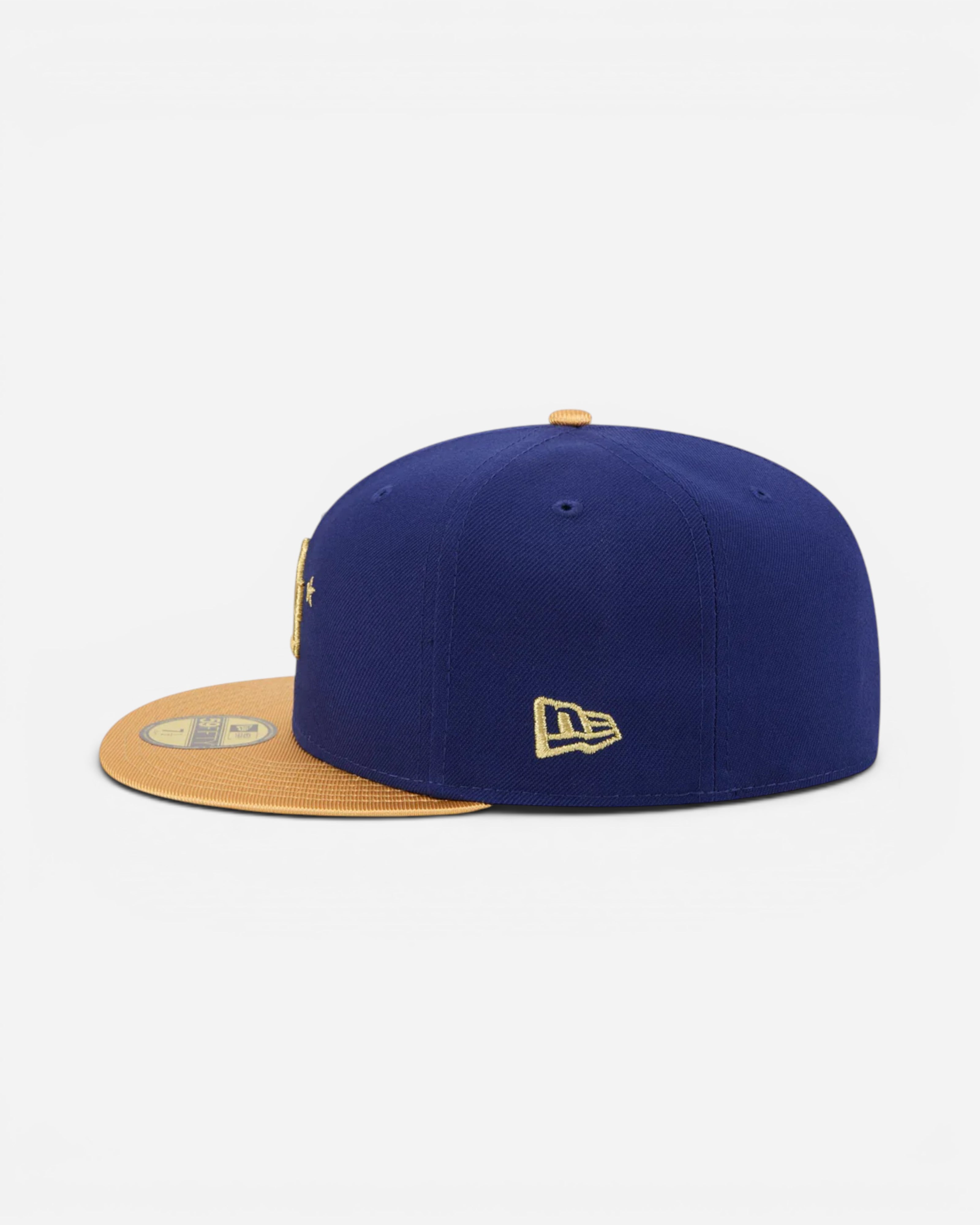Astrofat dark blue and gold fitted baseball cap with Los Angeles Dodgers logo and New Era branding.