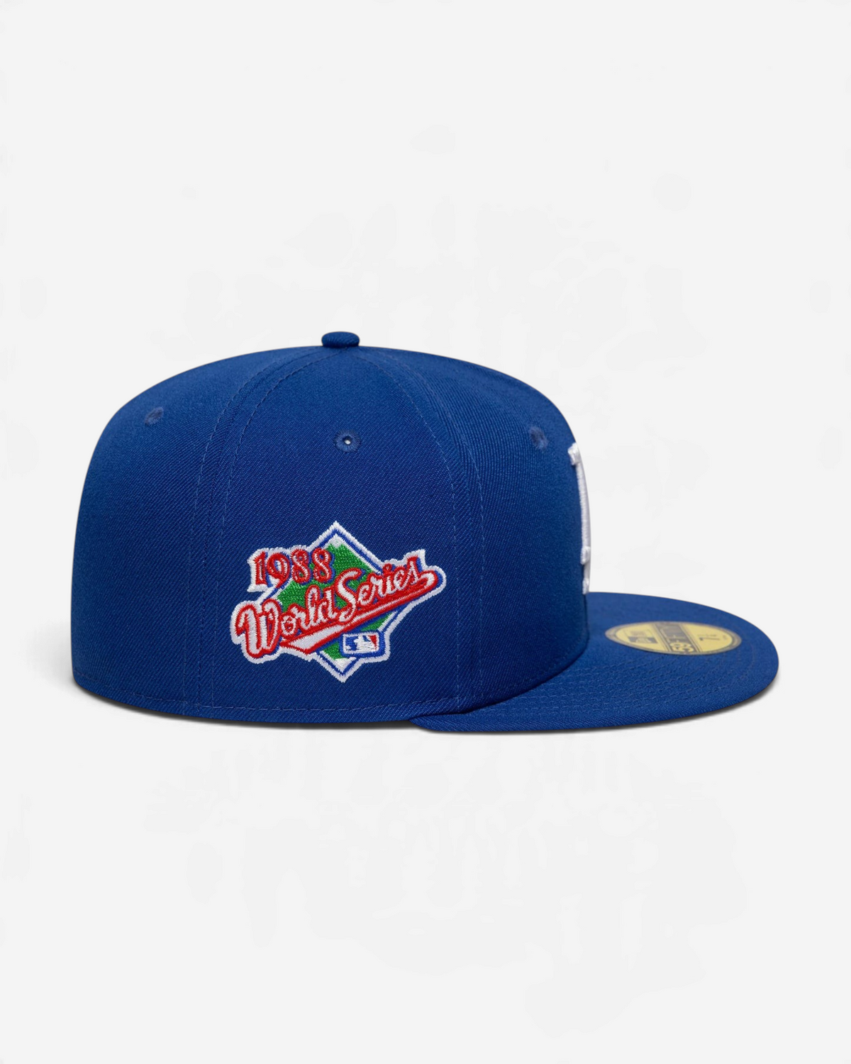 Astrofat blue 59FIFTY LA Dodgers fitted cap with a 1988 World Series patch on the side and a flat visor.