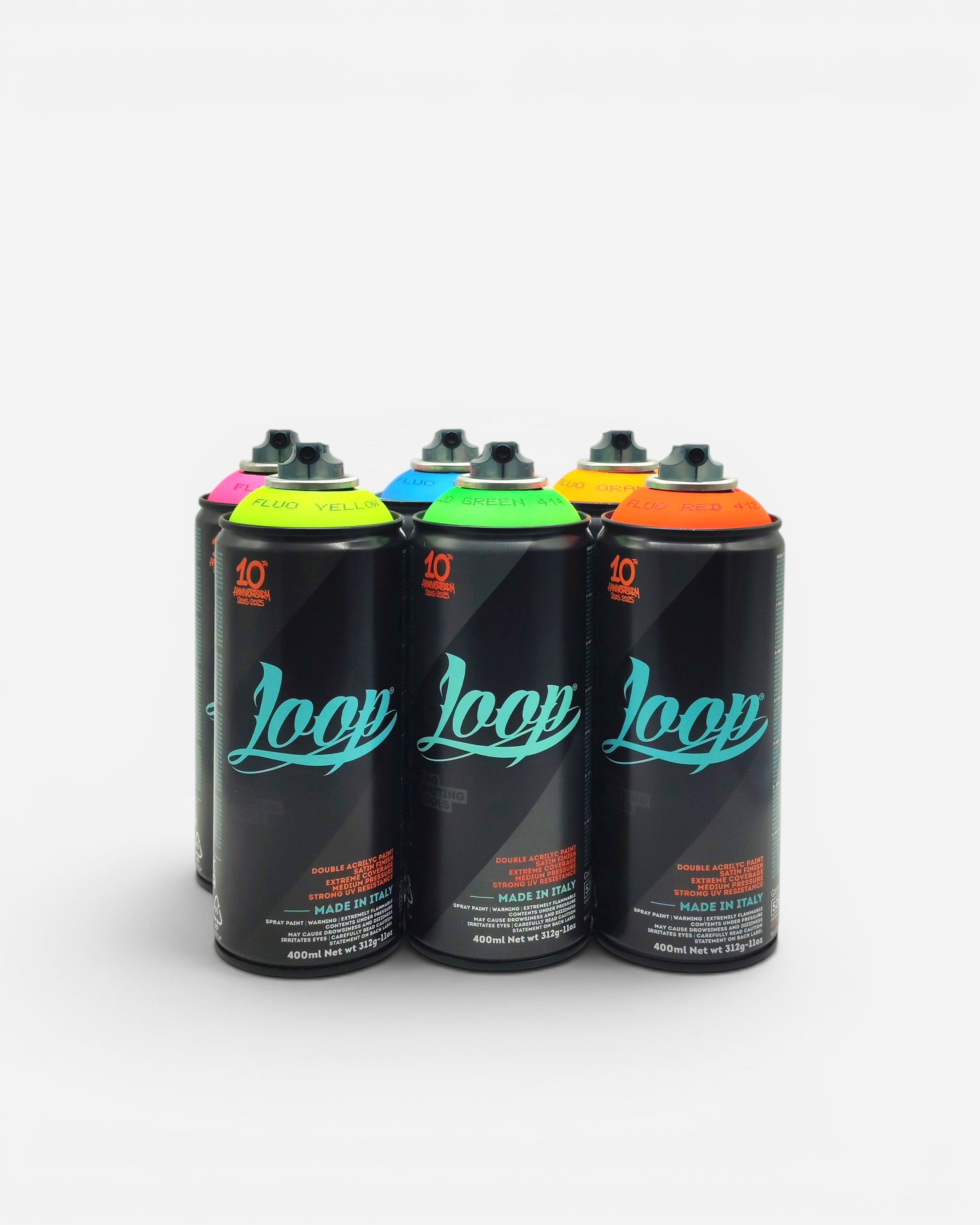 Astrofat Loopcolors Fluo 6x Pack of spray paint cans in fluorescent yellow, blue, green, and orange.