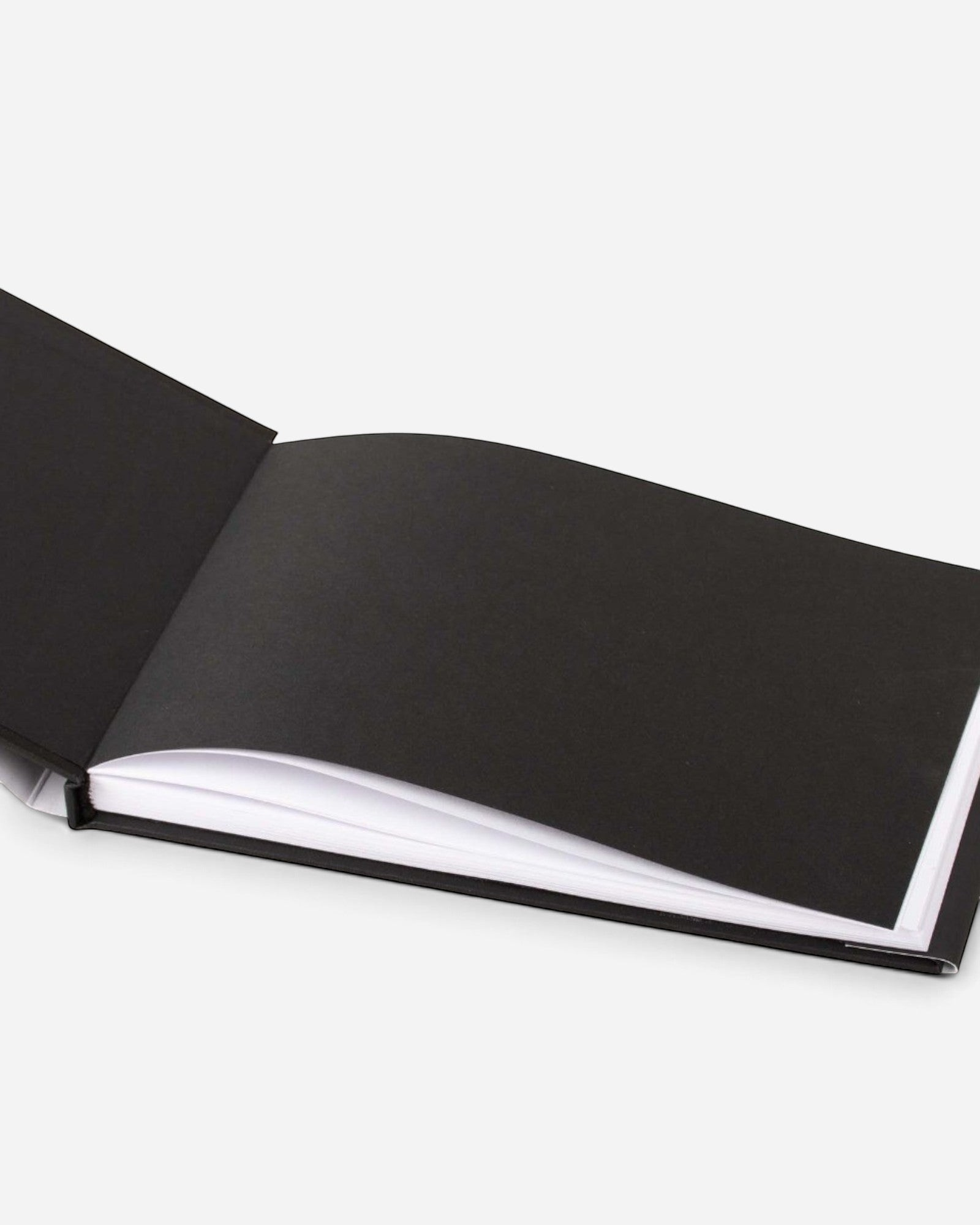 Astrofat Molotow A5 landscape blackbook with a black hard cover and white sketch paper pages.