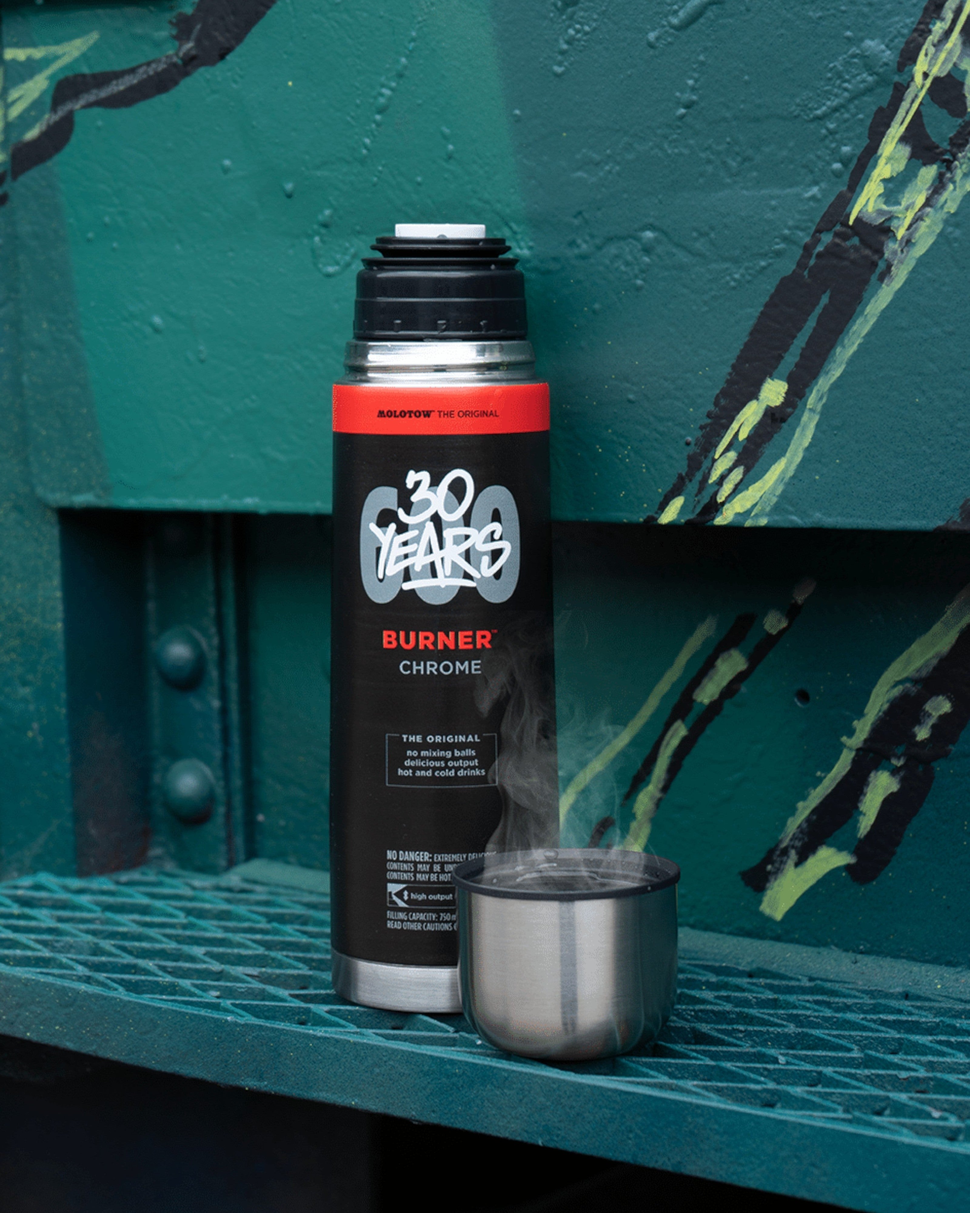 Astrofat Molotow Burner Chrome 750ml stainless steel thermos bottle with a spray can design and steaming cup.