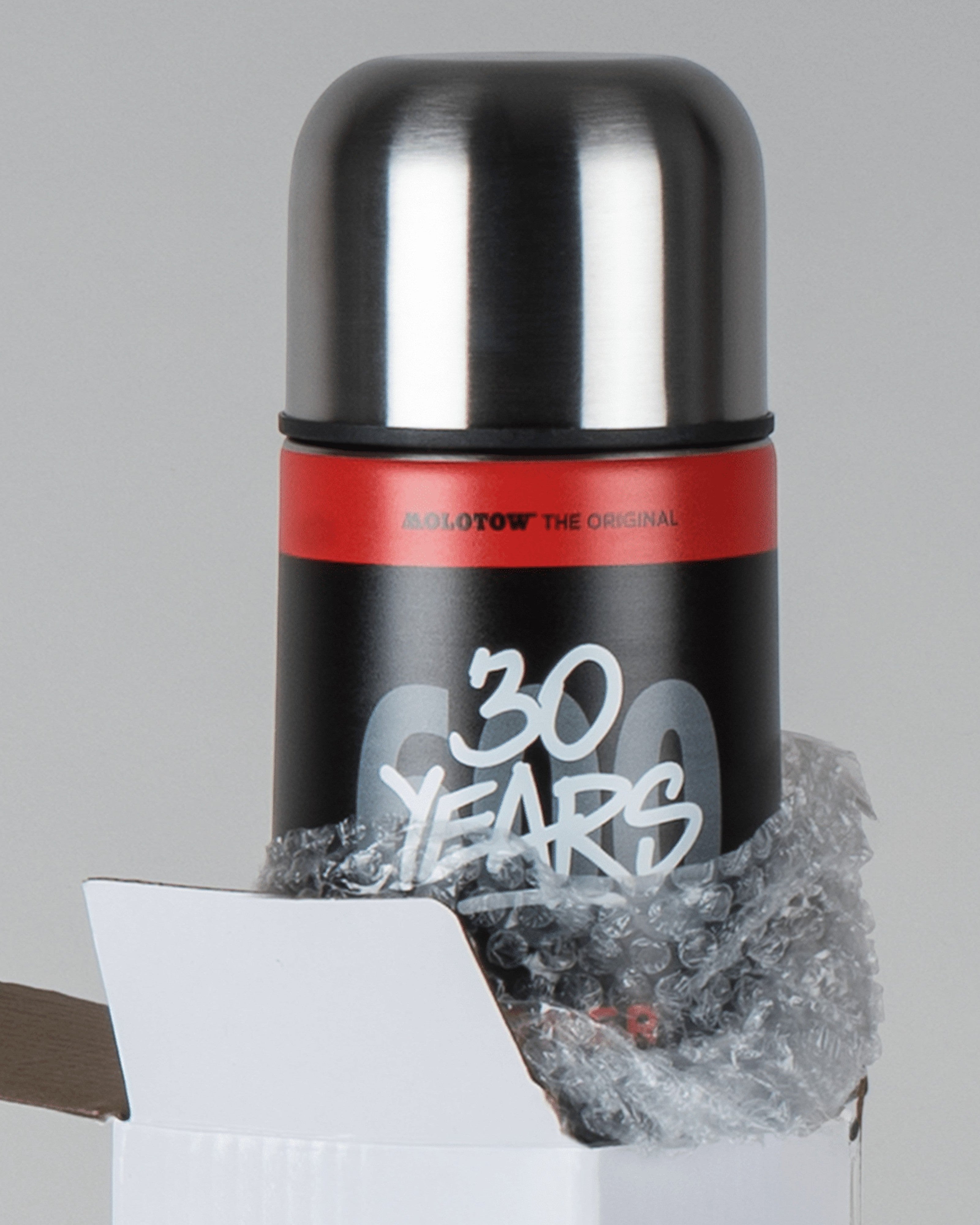 Astrofat Molotow Burner 30 Years anniversary stainless steel thermos bottle with matte black finish and silver cap.