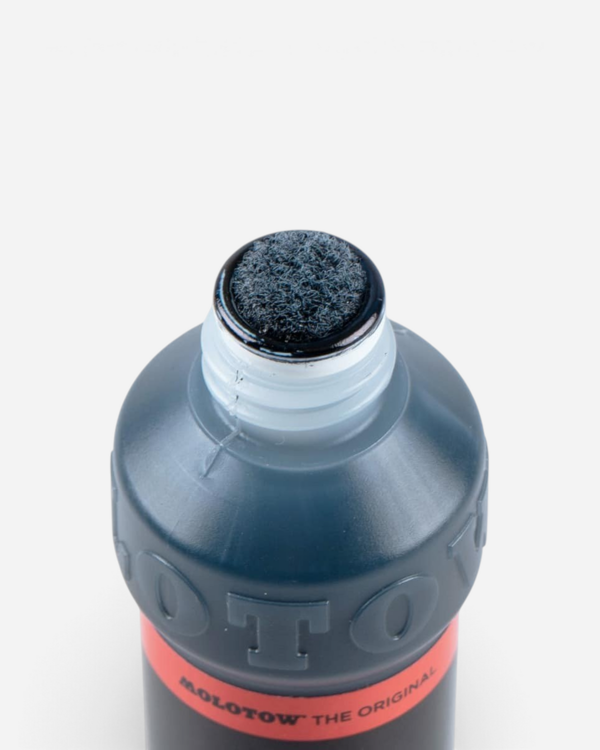 Astrofat Molotow 10mm high flow marker replacement felt tip attached to a black paint marker bottle