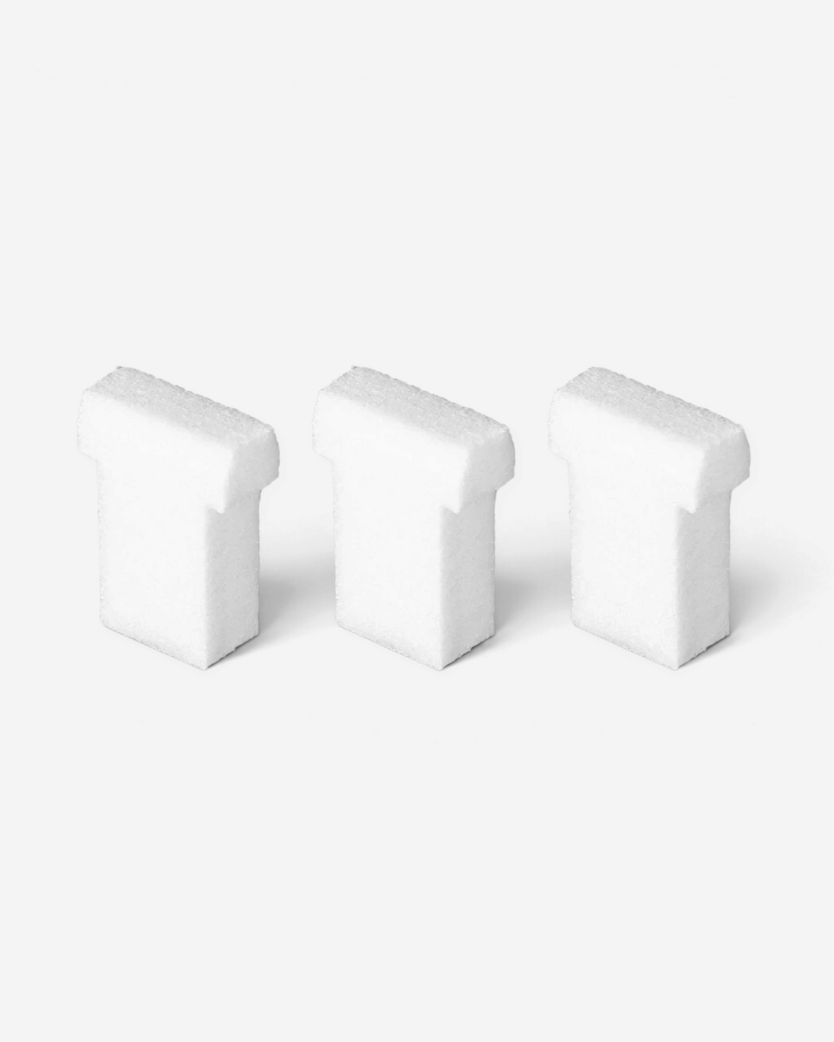 Astrofat pack of three white 15mm broad felt replacement tips for Molotow markers on a black background.