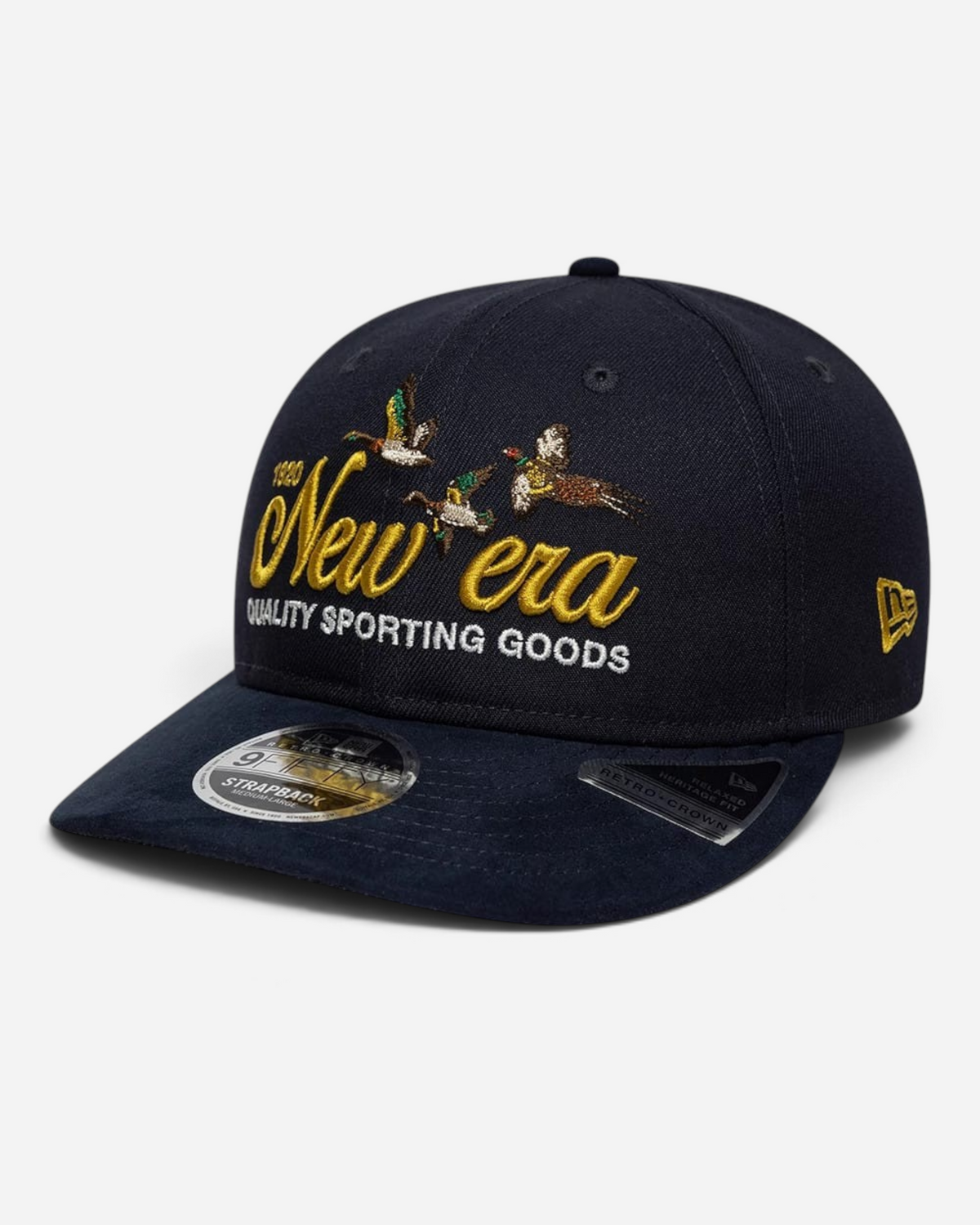 Astrofat navy blue 9FIFTY New Era retro crown cap with a suede visor and embroidered duck and wordmark graphic.